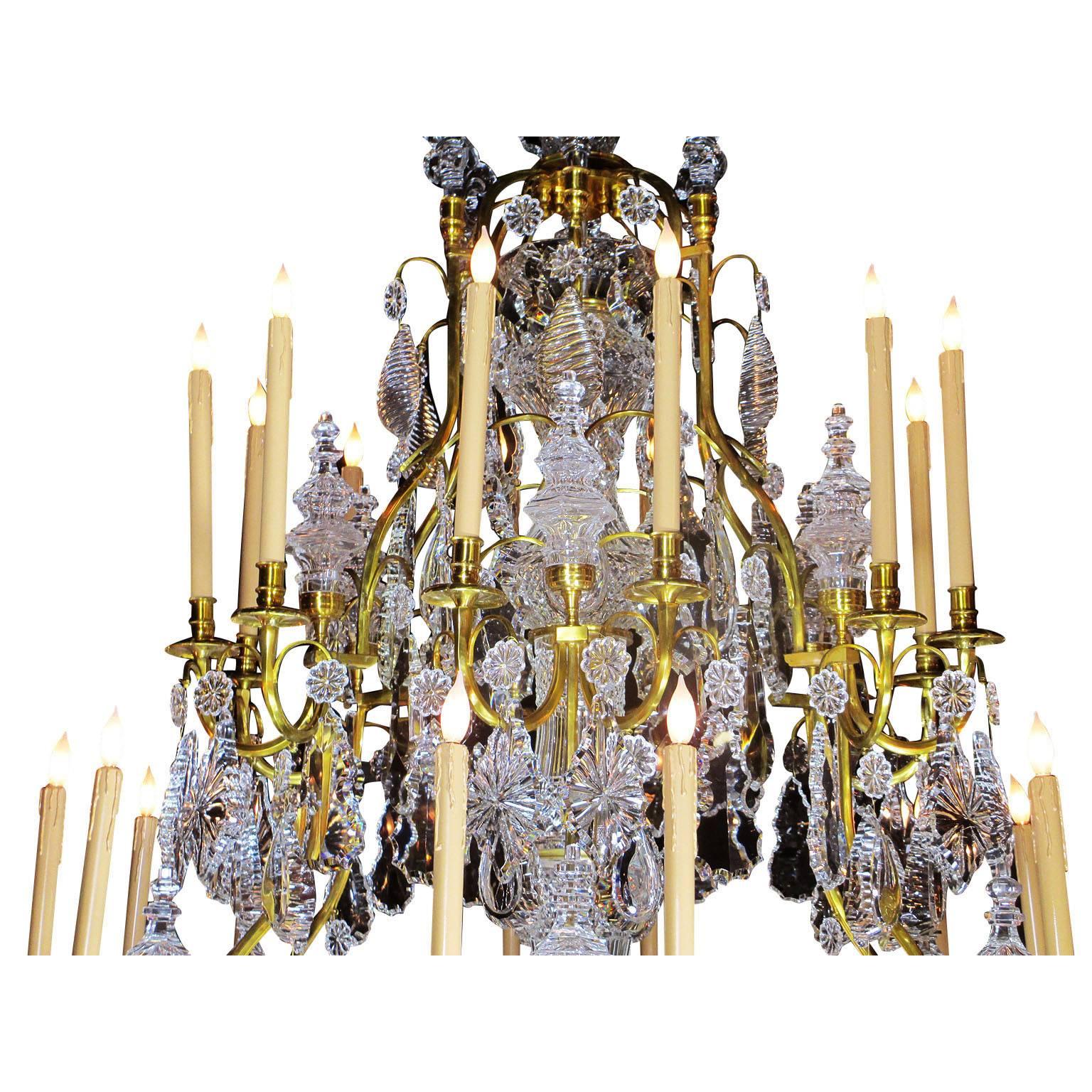 Carved A Louis XV Style Gilt-Bronze and Cut-Glass Twenty-four-light Chandelier  For Sale