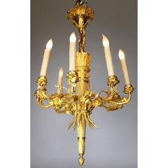 Raffinato lampadario a otto luci in bronzo dorato francese del XIX secolo in stile Luigi XVI