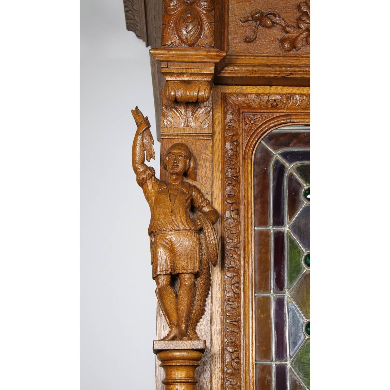 Großer italienischer Eichenholzschrank im Barockstil des 19. Jahrhunderts mit geschnitzten Figuren (Italienisch) im Angebot