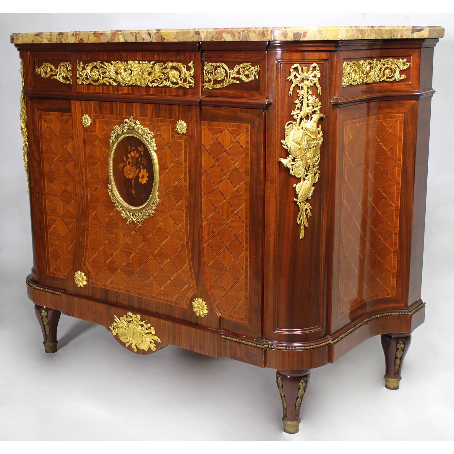 A very fine French 19th century Louis XVI style belle époque ormolu-mounted kingwood, satinwood and mahogany parquetry and marquetry demilune commode with a brèche d'alep marble top, attributed to François Linke (1855-1946). The single front