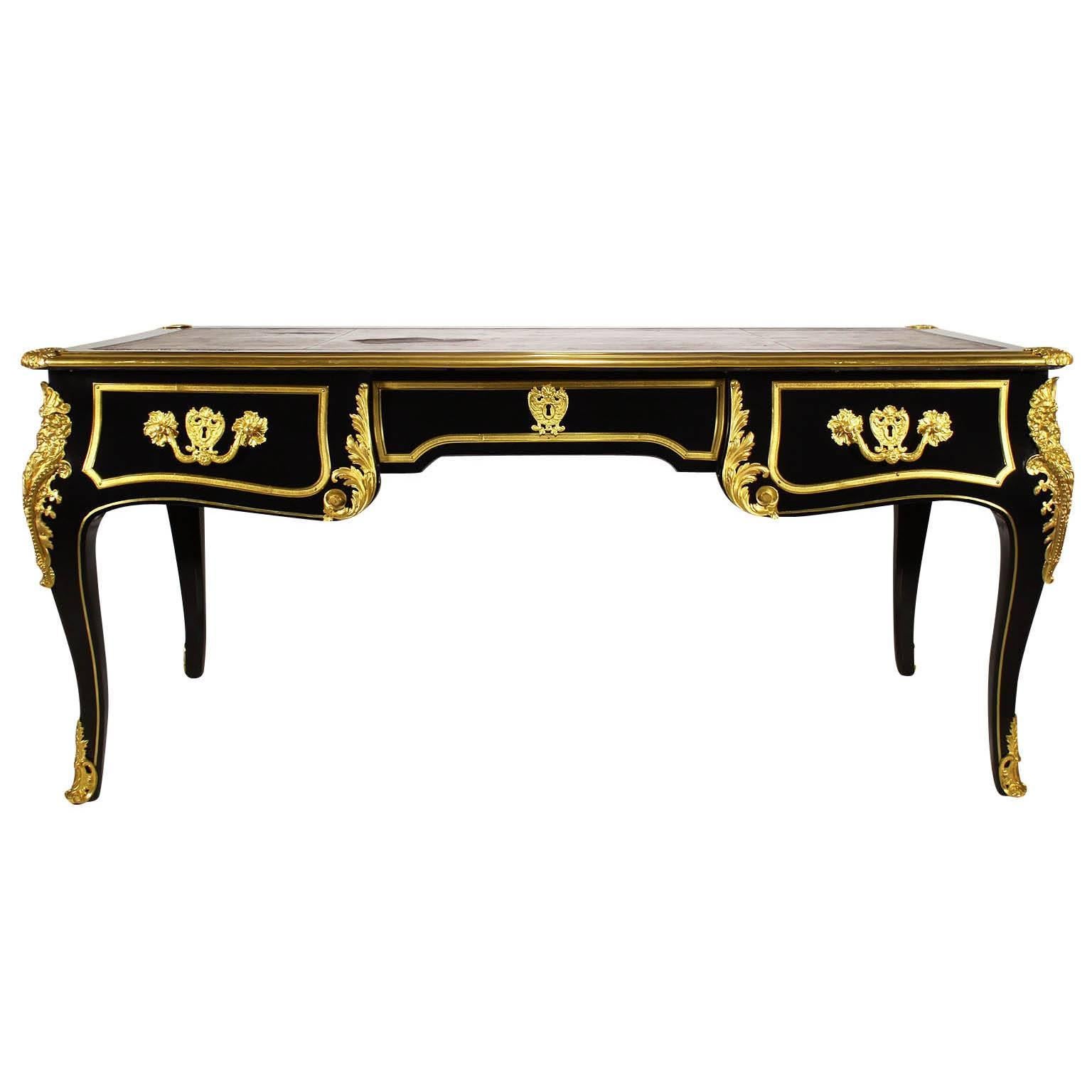 French 19th Century Louis XV Style Ebonized Wood and Gilt Bronze-Mounted Desk For Sale