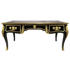 French 19th Century Louis XV Style Ebonized Wood and Gilt Bronze-Mounted Desk