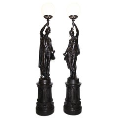 Pair of French 19th Century Lifesize Cast-Iron Sculpture Torcheres, Val d'Osne