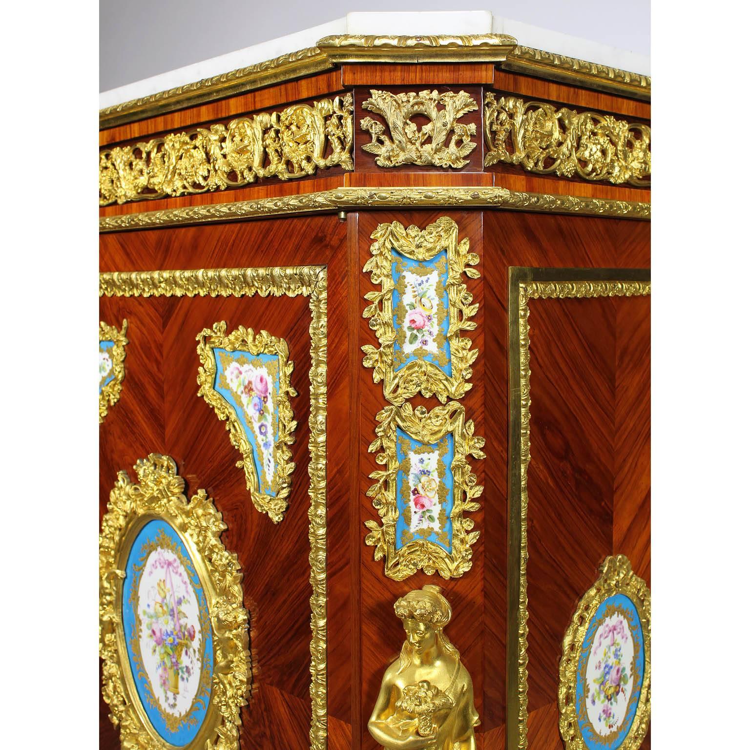 Marble Pair of French Napoleon III Figural Ormolu and Porcelain Mounted Side-Cabinets For Sale