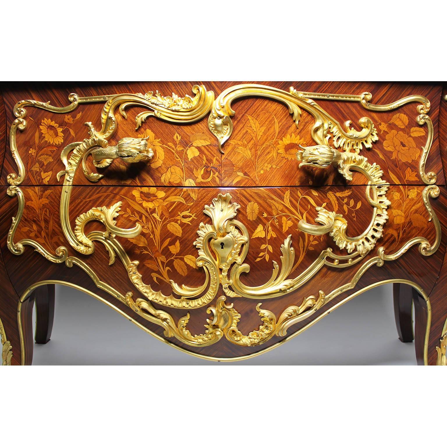 A very fine French mid-19th century Louis XV style gilt bronze-mounted tulipwood, kingwood and fruitwood marquetry bombé two-drawer commode with marble top, by Bourdet, Paris, After a model by Jean Baptiste Hedouin (French, 1738-1783). circa: Paris,