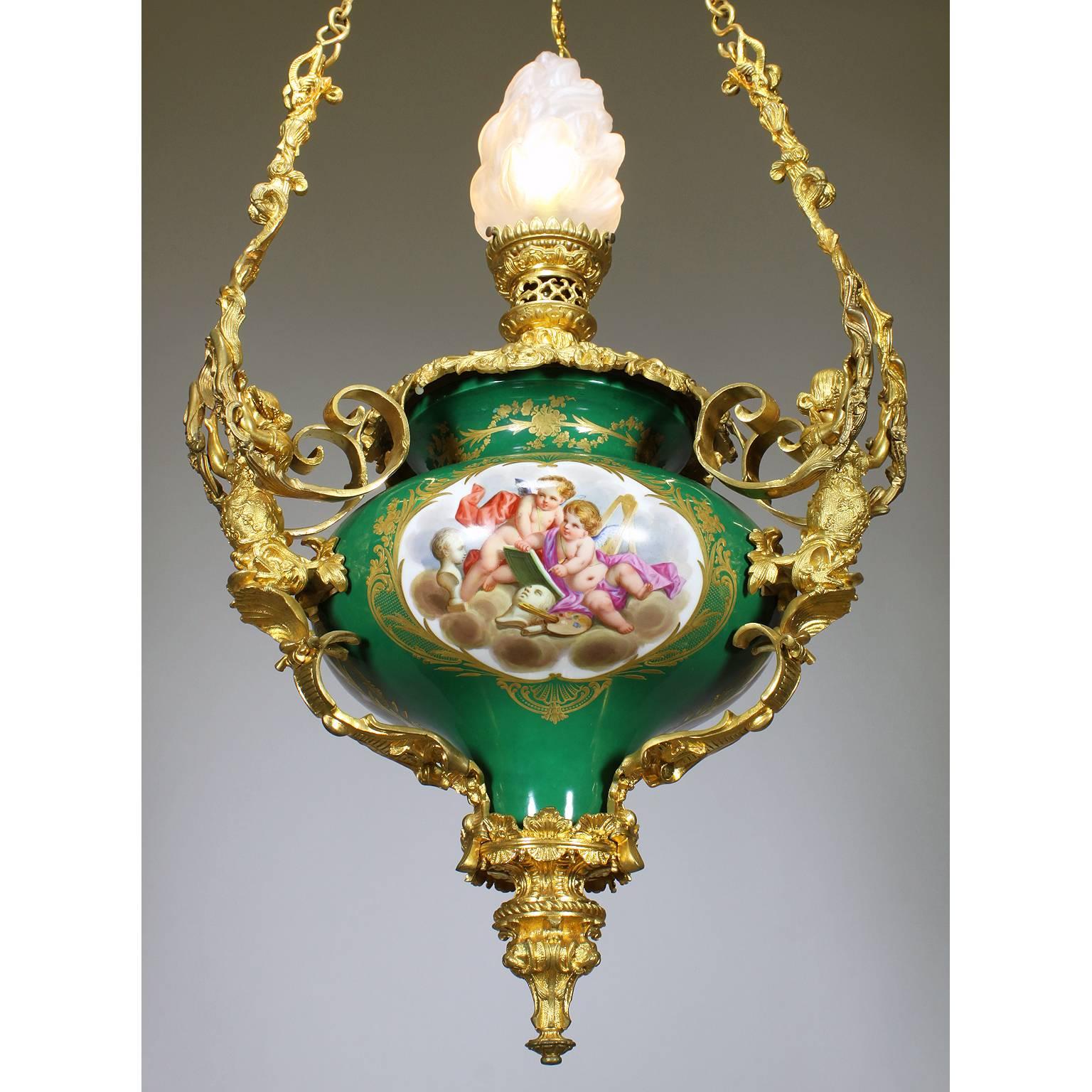 A very fine, French 19th century renaissance revival style figural porcelain and ormolu-mounted hanging single light lantern, previously an oil lantern. The ovoid green porcelain reservoir, probably by the Royal French Factory of Sevres, with