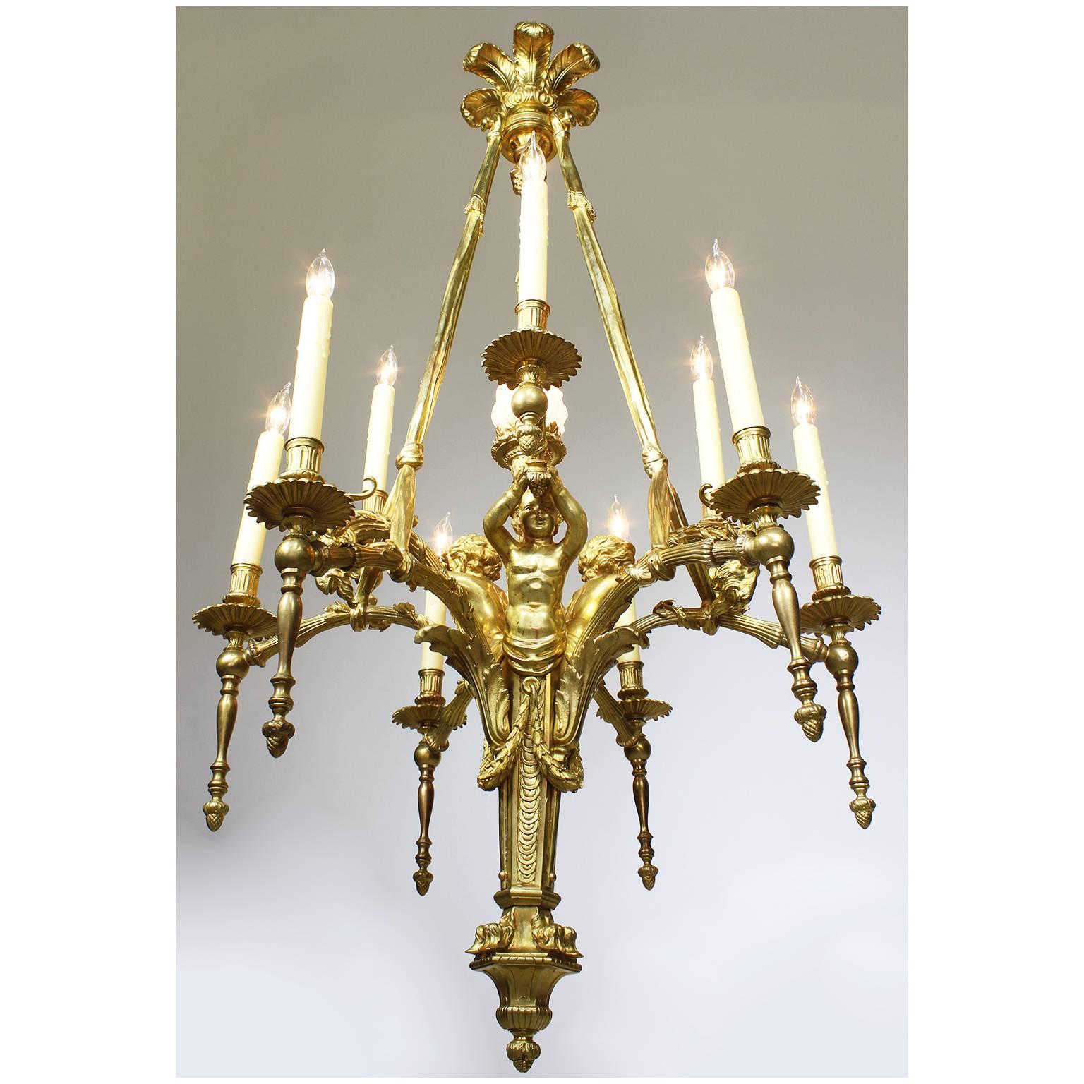 A very fine French 19th-20th century Belle Époque ten-light chandelier, Paris, circa 1900. The Royal peacock feather-cast corona centered with pine-cone finial drop, supporting three suspending tasseled swags, the nine candelabrum alternating with