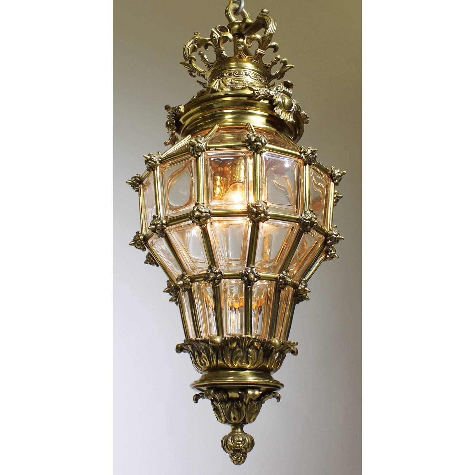 A French early 20th century Louis XIV style gilt bronze and molded glass 