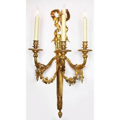 Pair of French 19th-20th Century Louis XVI Style Gilt-Bronze Torch Wall Sconces