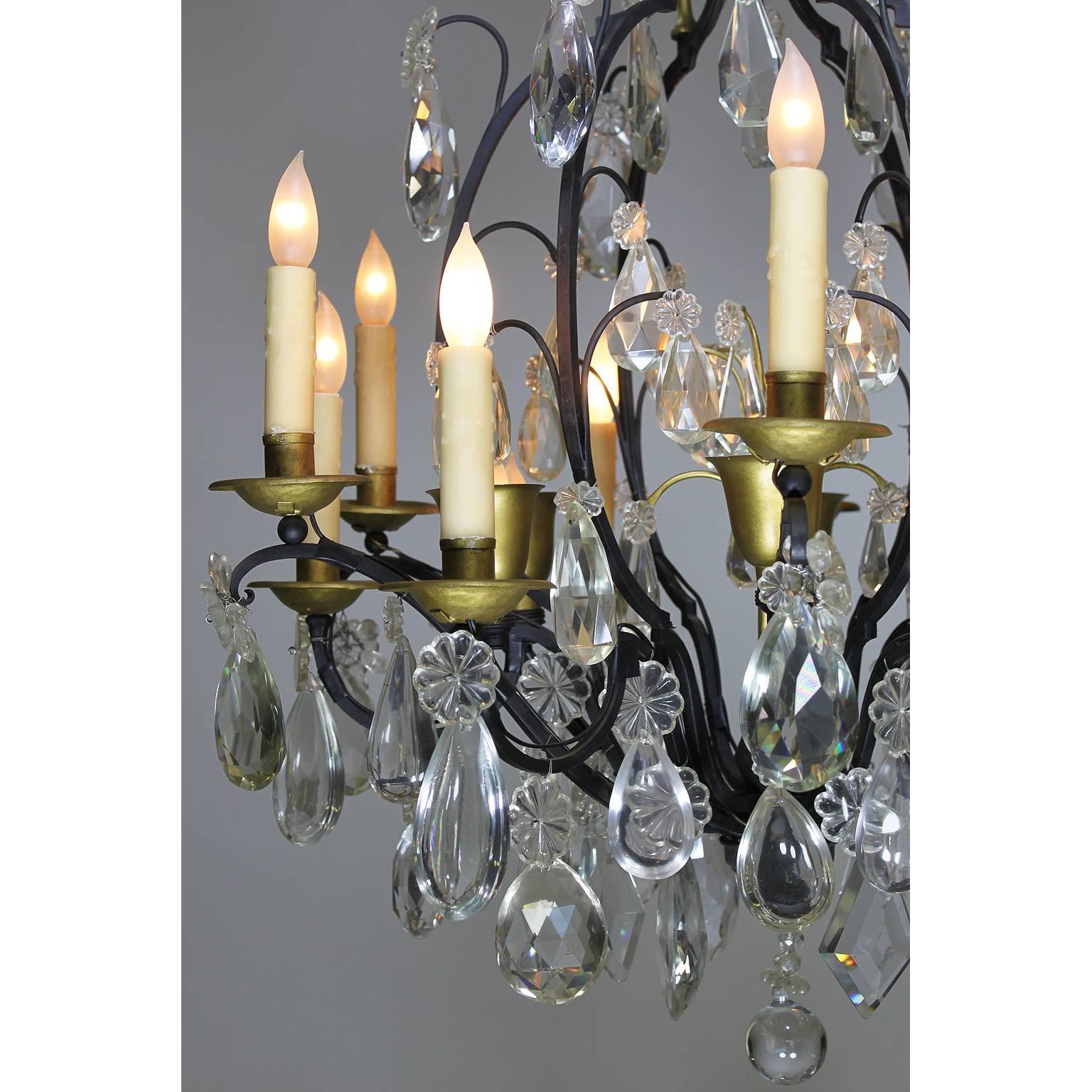 Carved 19th-20th Century Louis XV Style Wrought Iron Eighteen-Light Crystal Chandelier For Sale
