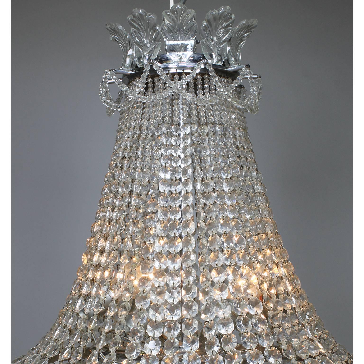 A very fine French Belle Époque 19th-20th century cut-glass cascade and silver plated bronze ten-light chandelier, attributed to Baccarat, Paris, circa 1900.

Measures: Height 35 1/2 inches (90.2 cm)
Width 23 1/2 inches (59.7 cm)