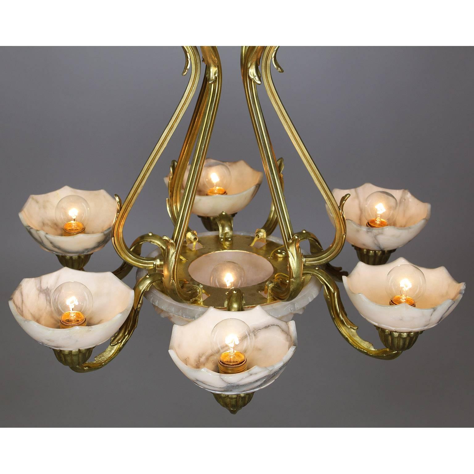 20th Century French Art Deco Gilt Bronze and Carved Alabaster Seven-Light Chandelier For Sale