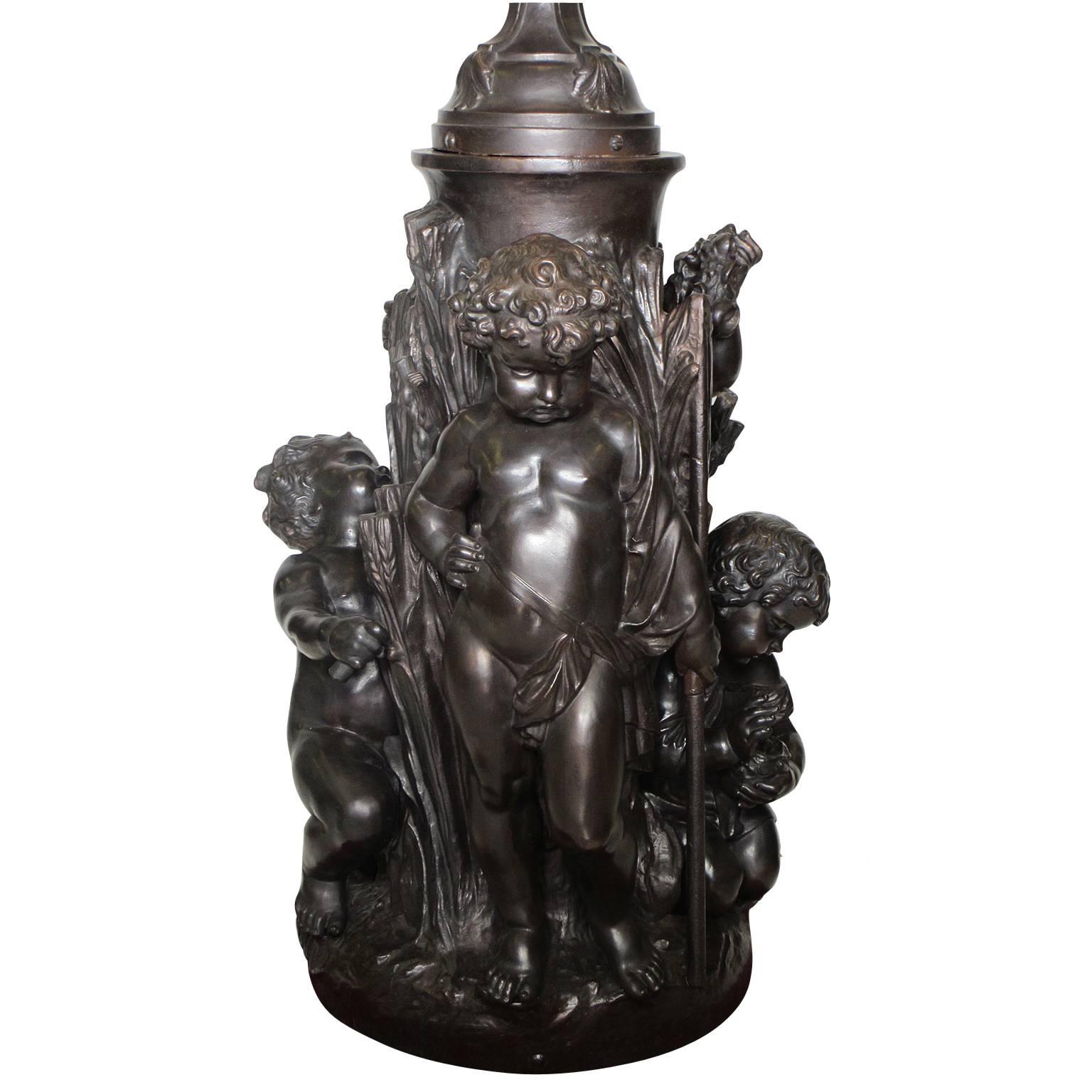 A very fine and palatial French 19th-20th century allegorical figural cast-iron group torchere - sculpture - fountain - representing spring and the harvest, probably cast by Le Fonderies d'Art du Val d'Osne. The charming four-putti sculpture with a