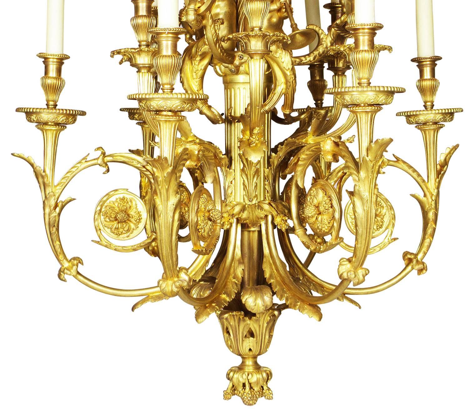 A palatial and superb quality French, 19th century Louis XVI style ormolu figural six-light chandelier with figures of cherubs, after the model by Pierre Gouthiere in the cabinet doré for Marie-Antoinette at the royal palace of Versailles. The