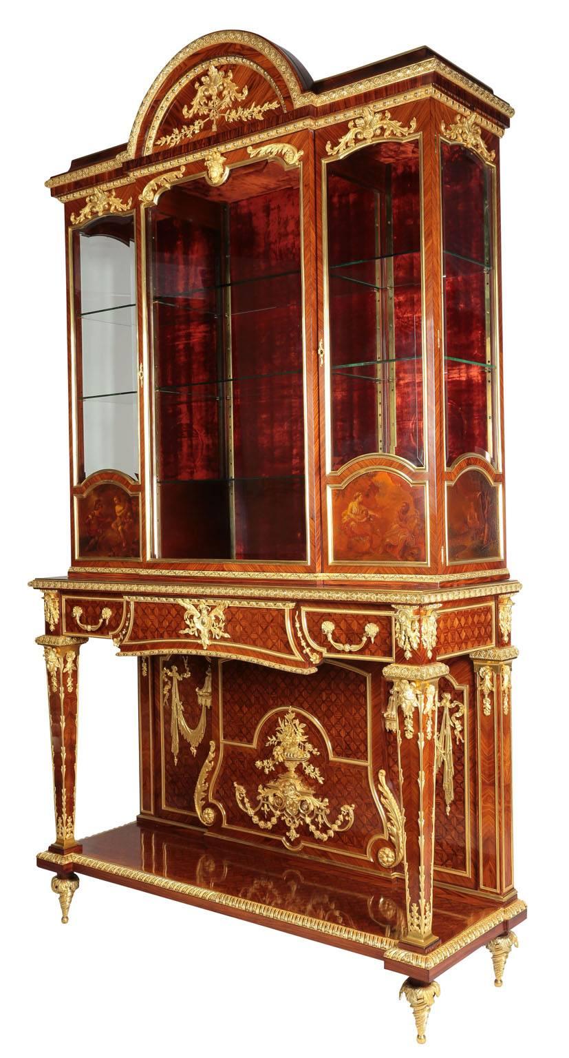 A superb quality palatial French Louis XVI style ormolu mounted, satinwood, kingwood parquetry and Vernis Martin style paneling three-door raised Vitrine Display Cabinet attributed to Paul Sormani (1817-1877). 

The Vernis Martin Panels signed 