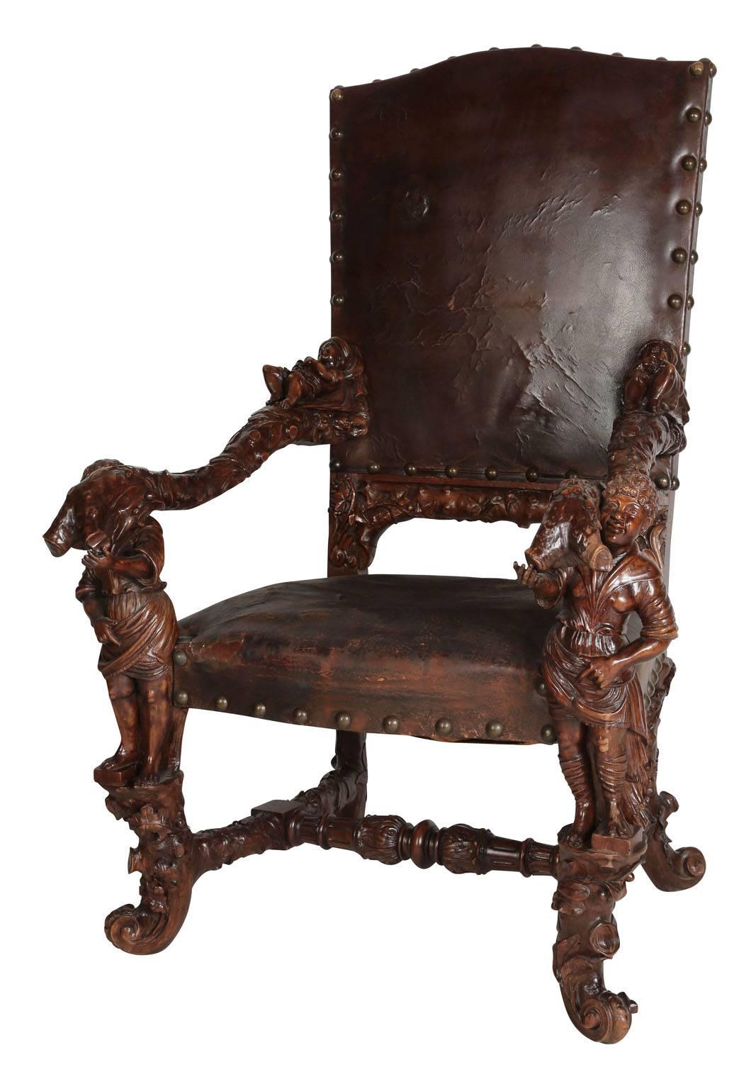 A very fine pair of palatial Venetian walnut carved mid-19th century Baroque figural throne armchairs, attributed to Valentino Panciera Besarel (Venice, 1829-1902) in the manner of Andrea Brustolon (1662-1732). The ornately carved thrones, each