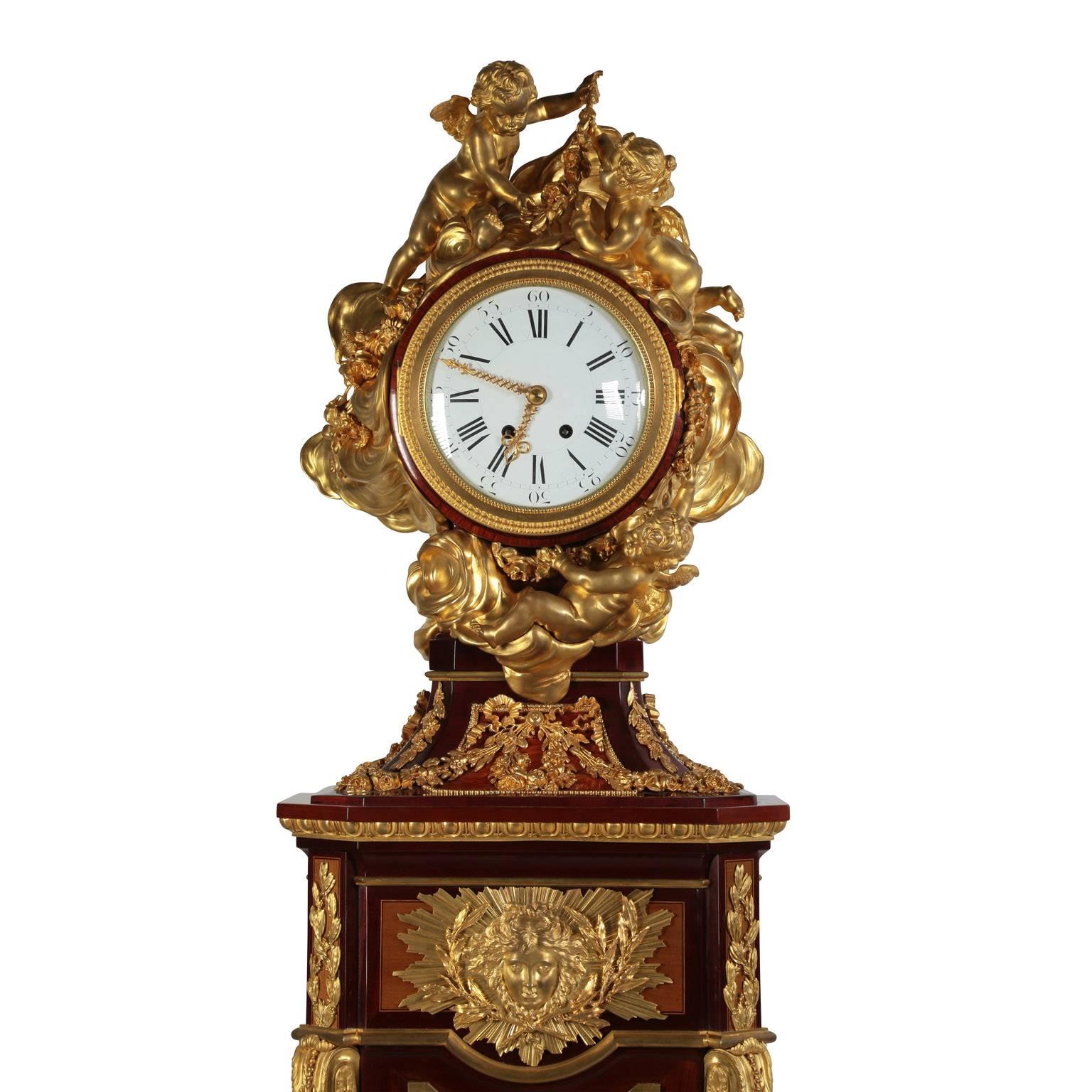 A very fine French 19th Century Louis XVI style ormolu-mounted amaranth, tulipwood, sycamore and parquetry pedestal Régulateur de Parquet Tall Case Clock, Attributed to Alfred Emmanuel Louis Beurdeley (French, 1847-1919) After the model attributed