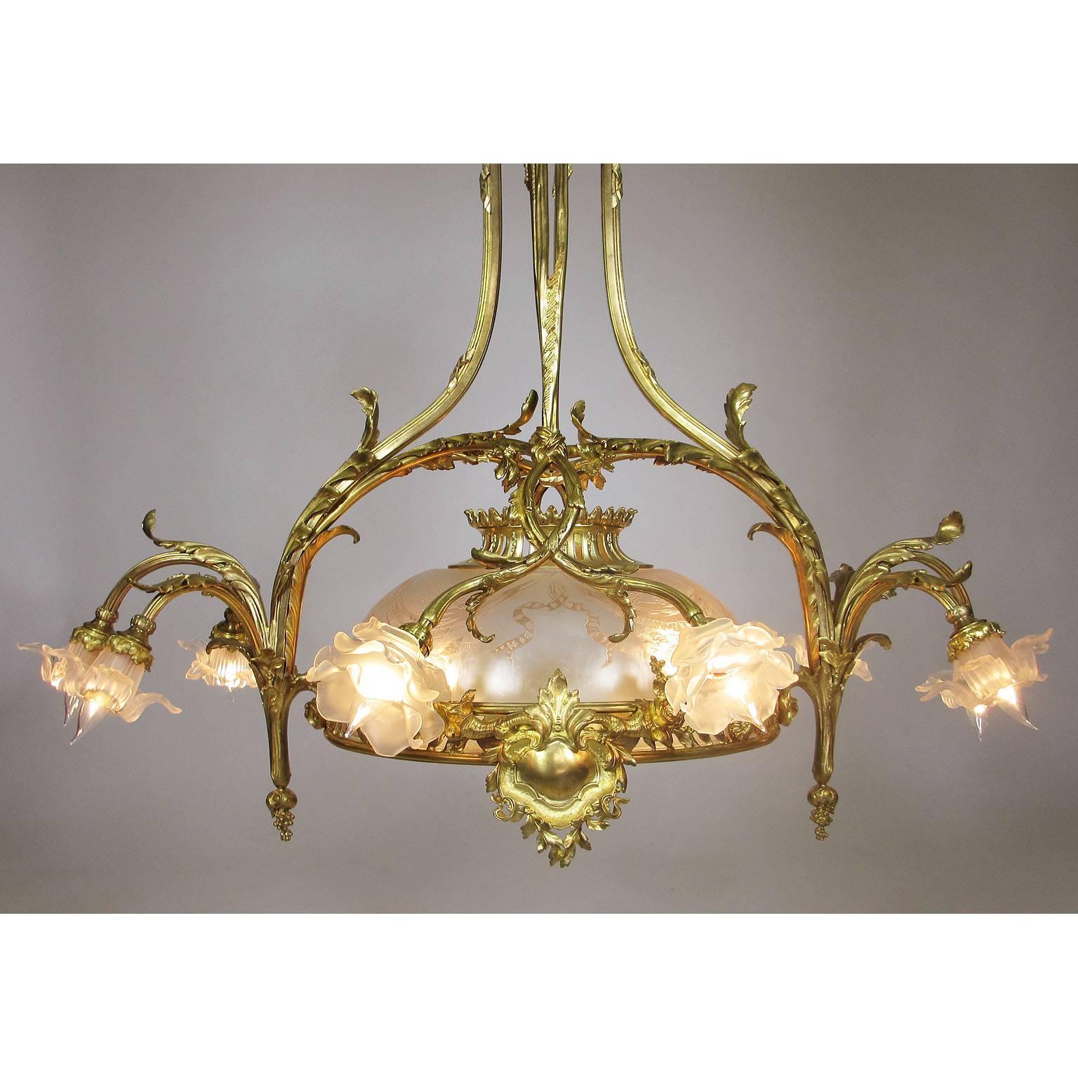 A fine French 19th-20th century Belle Époque gilt bronze and frosted molded glass 