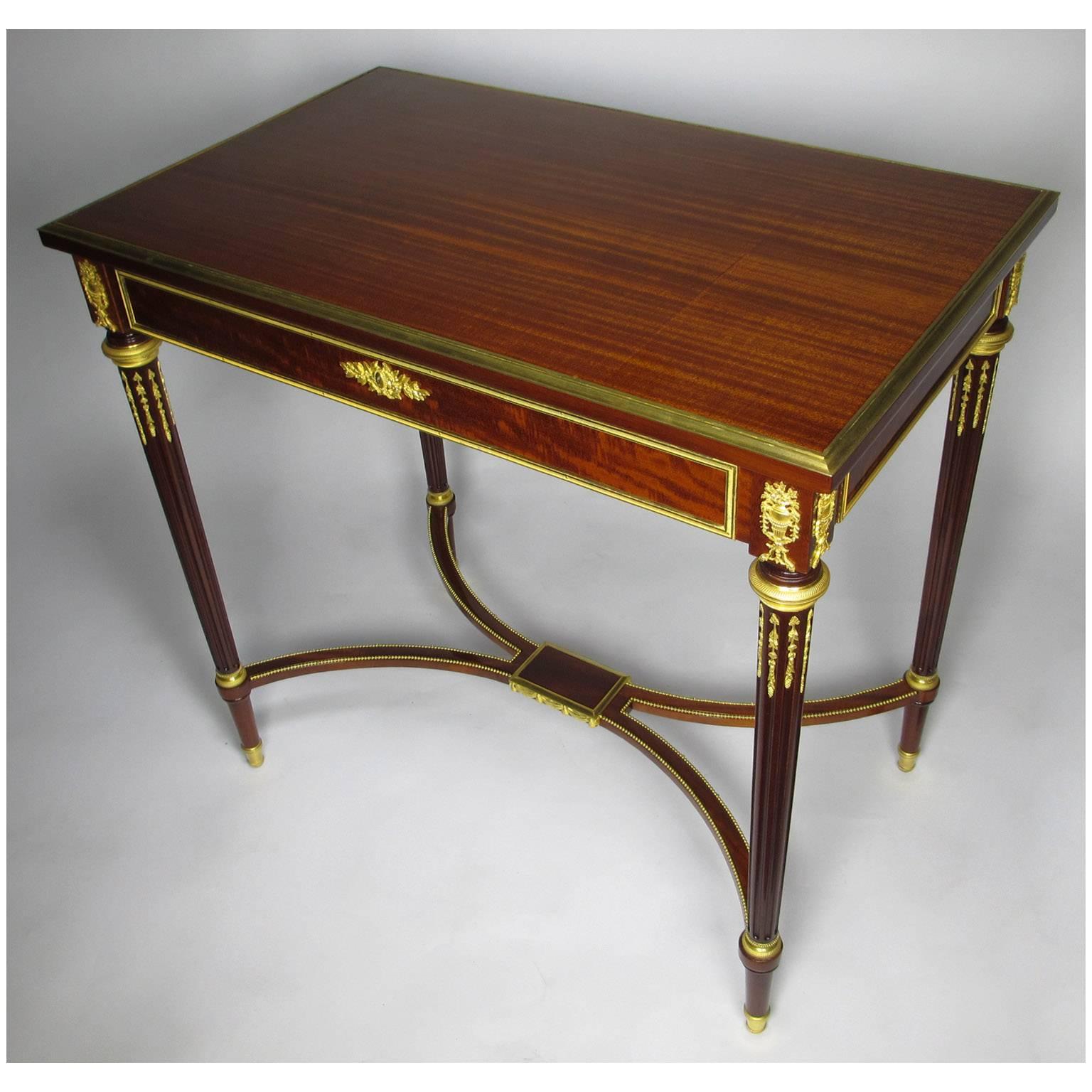 A very fine French 19th century Louis XVI style mahogany and ormolu-mounted side table with drawer by François Linke. The foliate key plate with ormolu banding repeated on all sides of frieze with ornate urn mountings on all corners. Table sits on