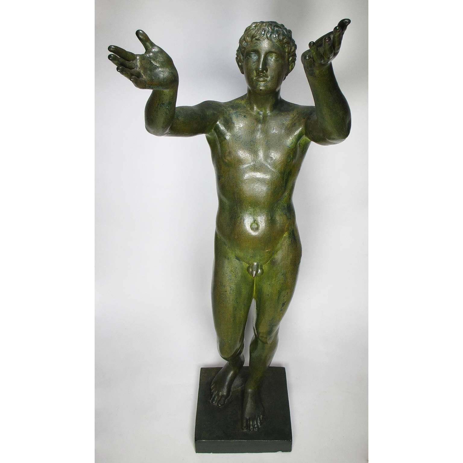 A fine pair of neoclassical Greco Roman style 19th century cast-iron figures of 