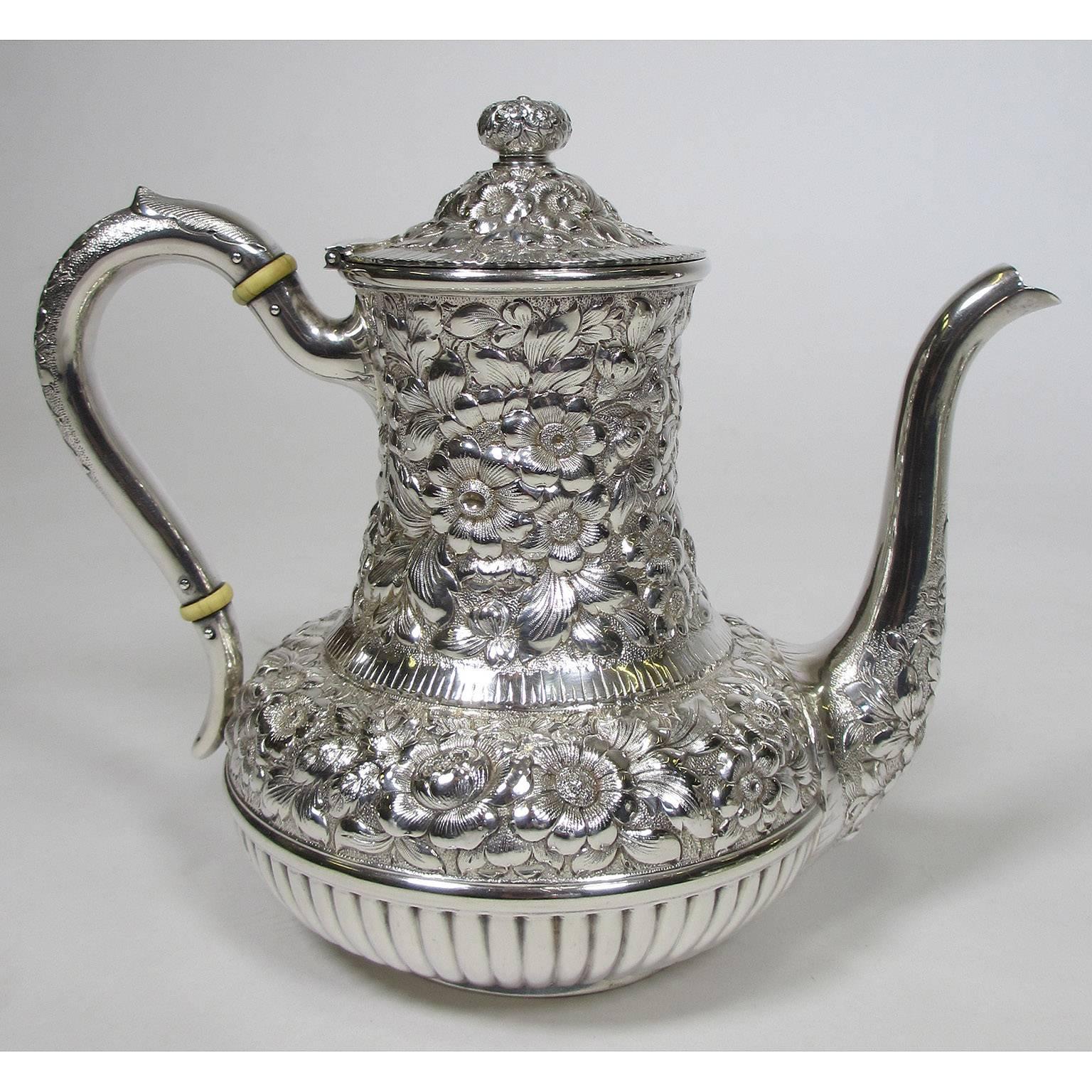 Rococo Revival Geo C. Shreve & Co. a Finely Chased Six Piece Sterling Silver Tea and Coffee Set For Sale