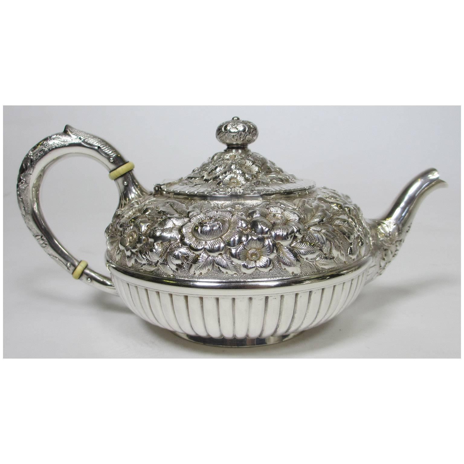 Geo C. Shreve & Co. a Finely Chased Six Piece Sterling Silver Tea and Coffee Set In Good Condition For Sale In Los Angeles, CA