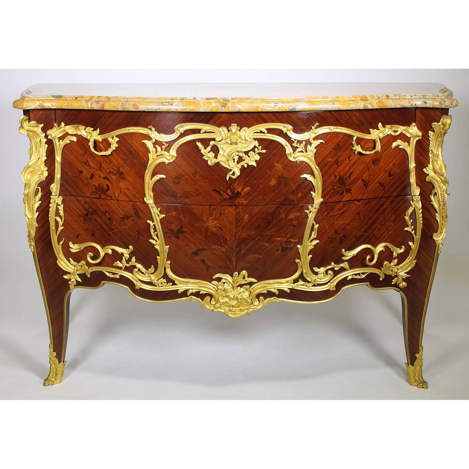A very fine and impressive pair of French 19th century Louis xv style gilt bronze-mounted kingwood, satinwood and tulipwood floral marquetry two-drawer bombé commodes attributed to François Linke, index number 1810, Paris, late 19th-early 20th
