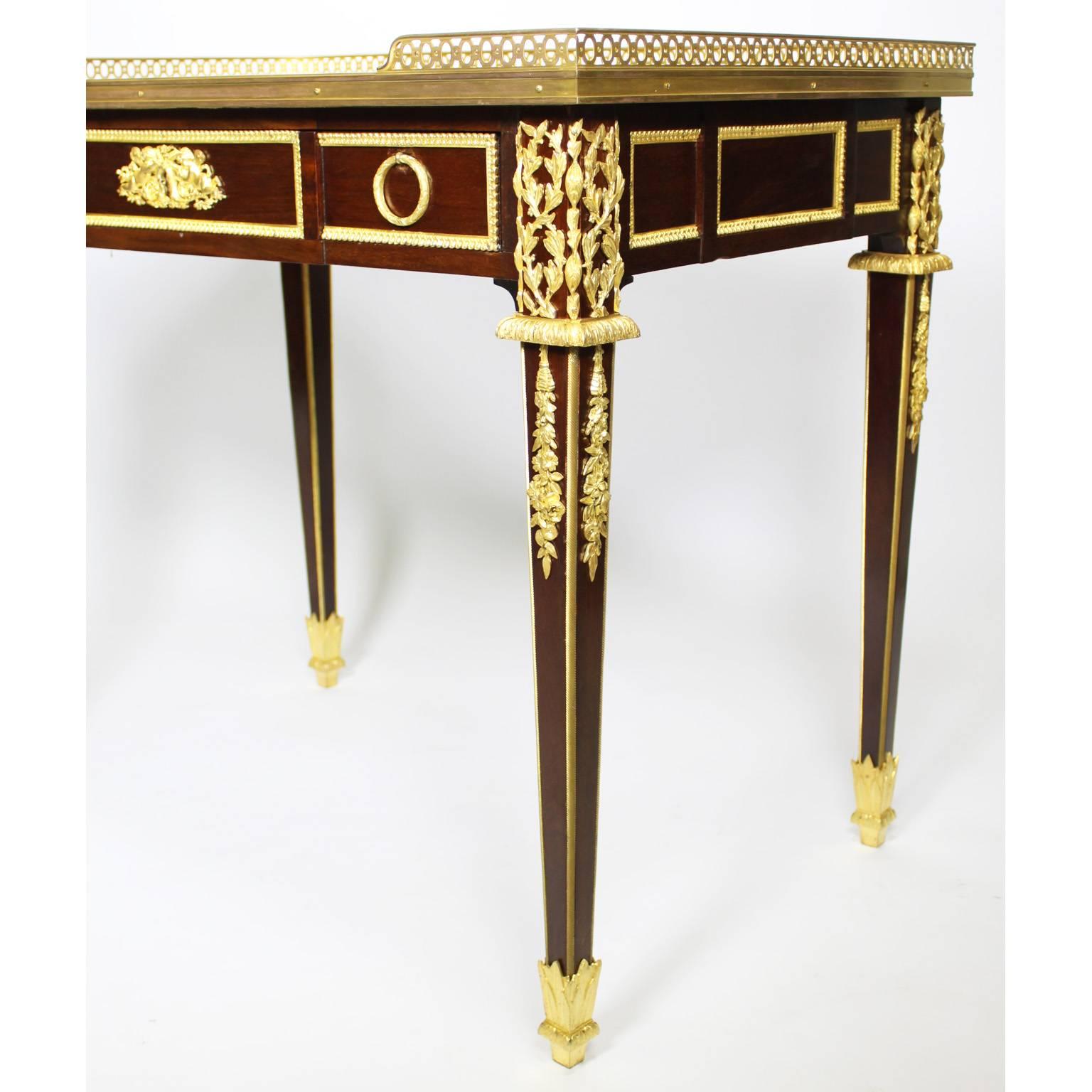 Carved French 19th-20th Century Louis XVI Style Mahogany and Gilt-Bronze Mounted Table