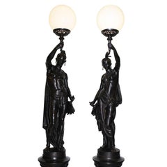 Coppia di torce scultura in ferro fuso a grandezza naturale del XIX secolo, Val d'Osne