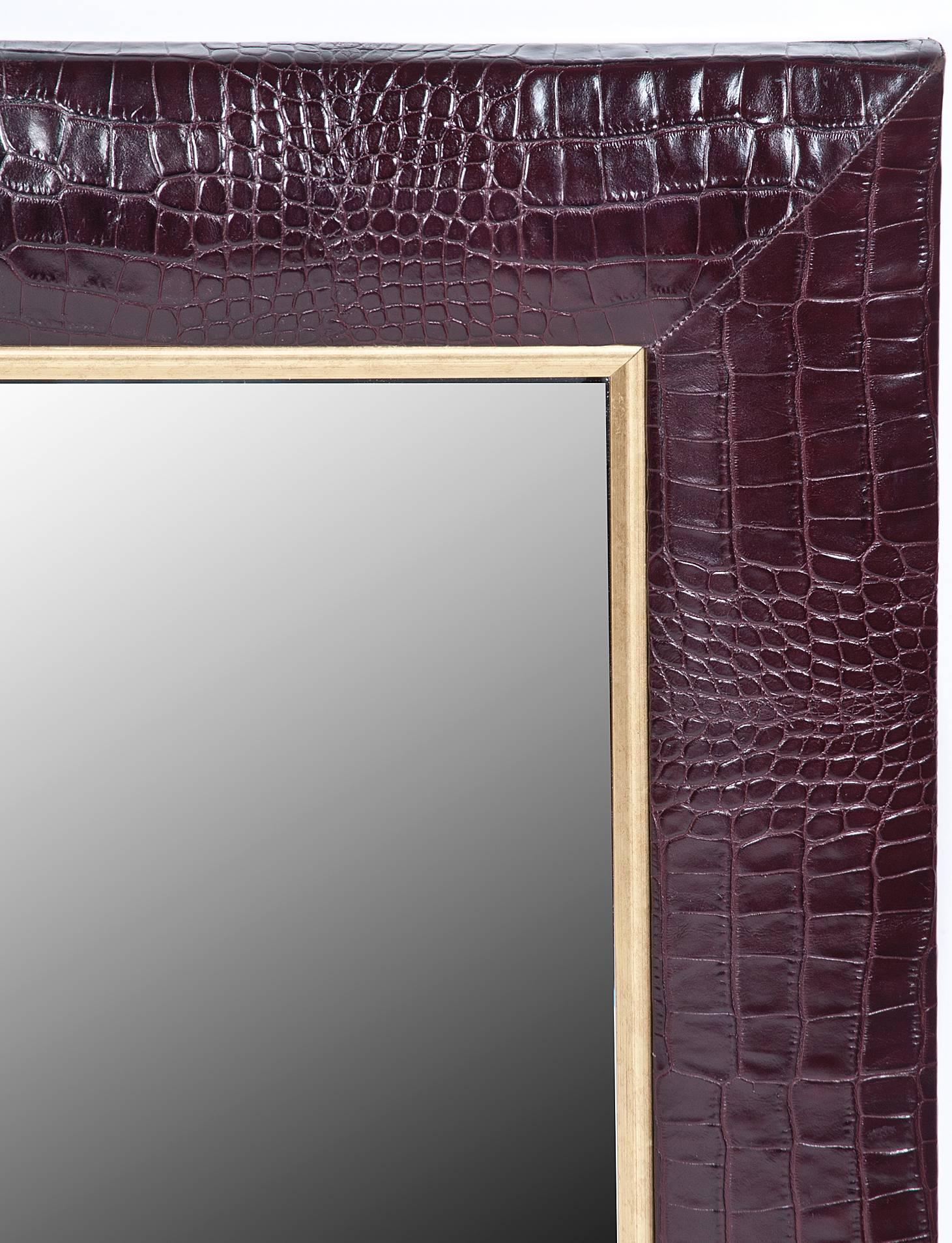 • Crocodile Embossed Bordeaux Italian Leather with champagne gold detailing
• 1 ¼” Beveled Mirror
• 4” wide leather frame
• Hand-stitched corners
• Measurements including frame – 28”W x 32”H x 1”D

Additional quantity made to order upon