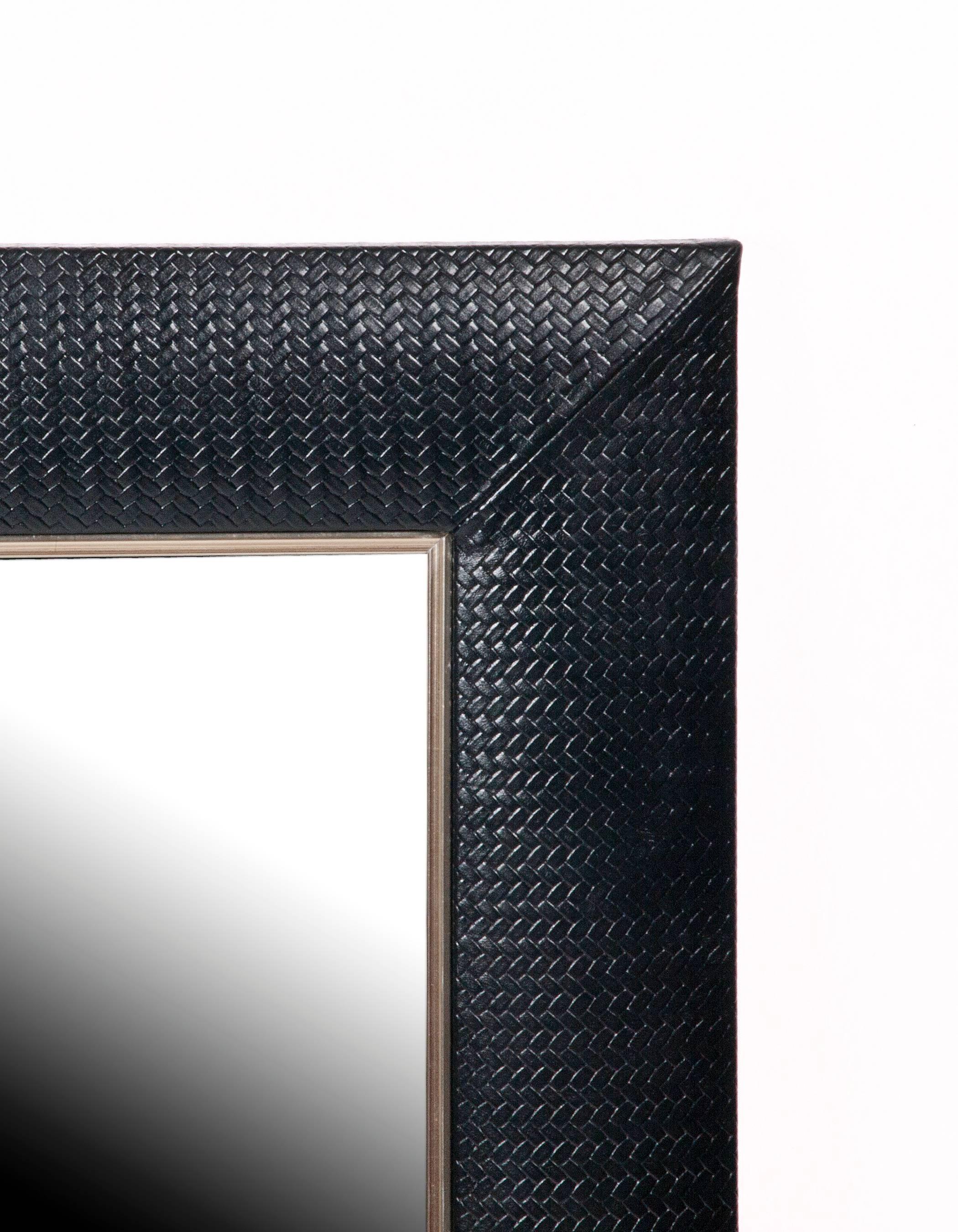 Contemporary nero embossed weave leather framed mirror by Klasp home

Frame measuring 28 x 32