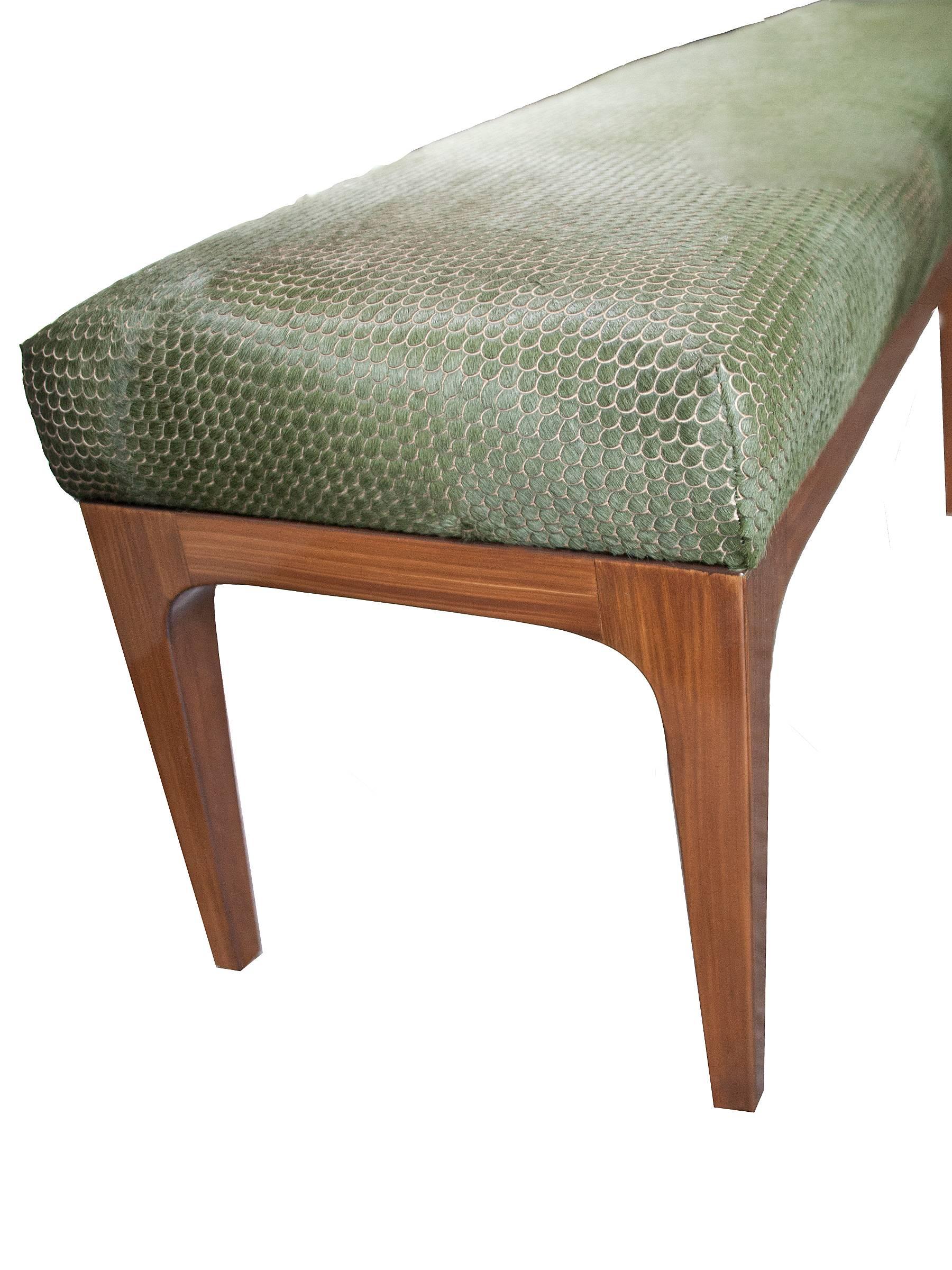 KLASP home Mid-Century Modern Style laser cut cowhide 6 foot bench.

Laser cut cowhide upholstered seat
Evergreen color
Cowhide origin - Normandy, France
Mid-Century Modern style frame - 100% maple wood (optional walnut - price may vary)
90