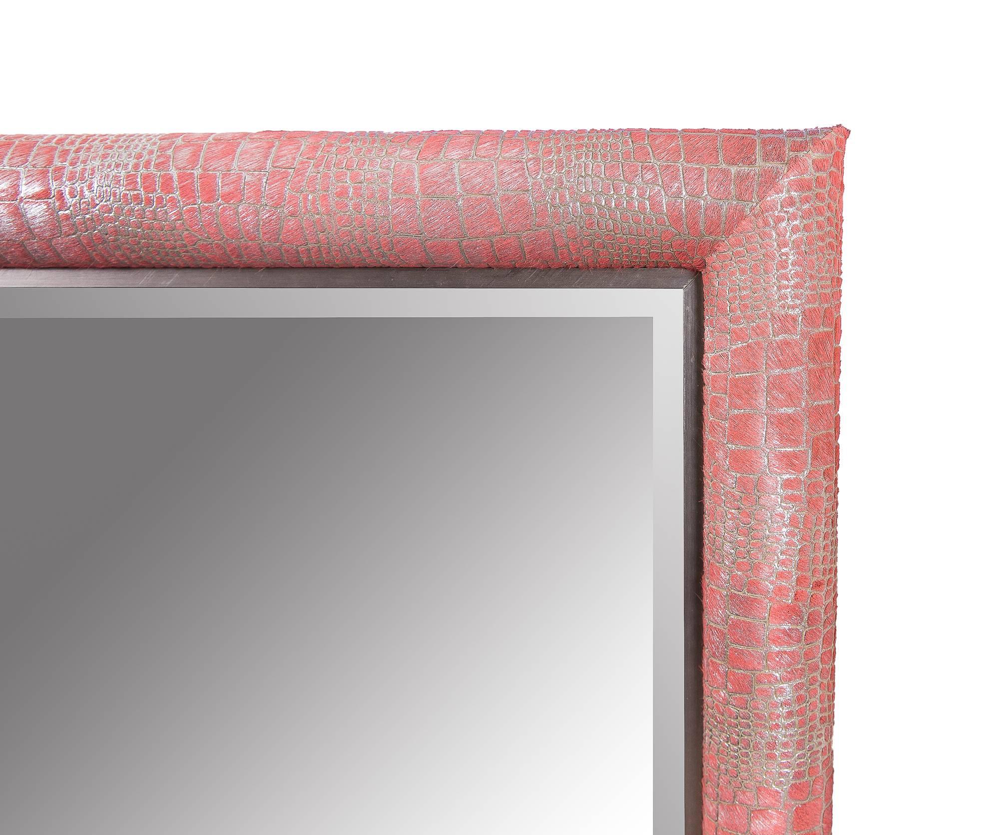 Contemporary crocodile laser cut pattern watermelon pink dyed cowhide framed mirror by KLASP home.

Measurements: 28.5