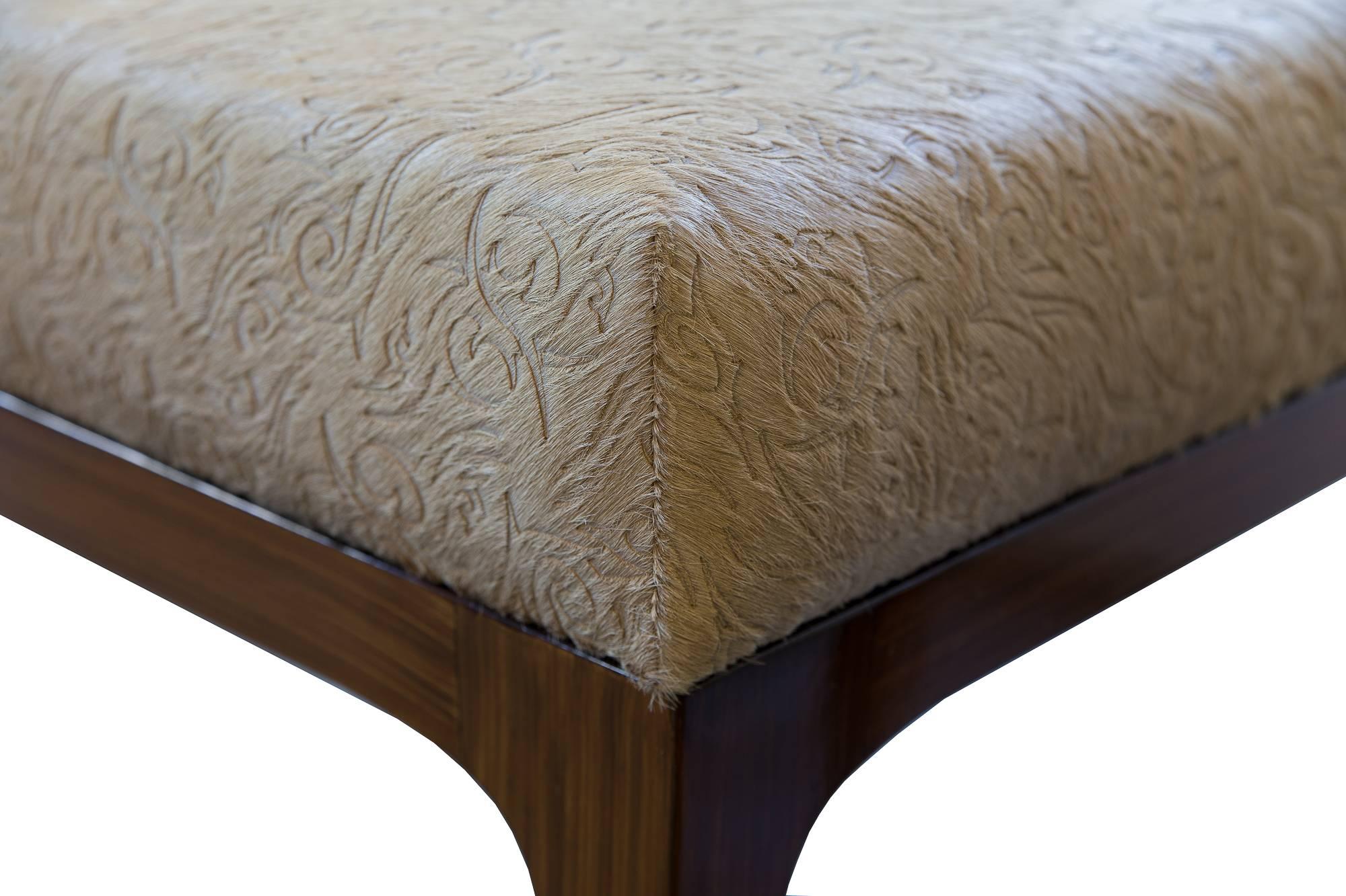The Raphael Ottomans by KLASP home

Mid-Century Modern style laser cut floral pattern cowhide ottomans, sold as a pair.

Laser cut floral pattern cowhide in caramel
Sold as a pair 
Normandy cowhide
Mid-Century Modern frame
90 shine
Dark