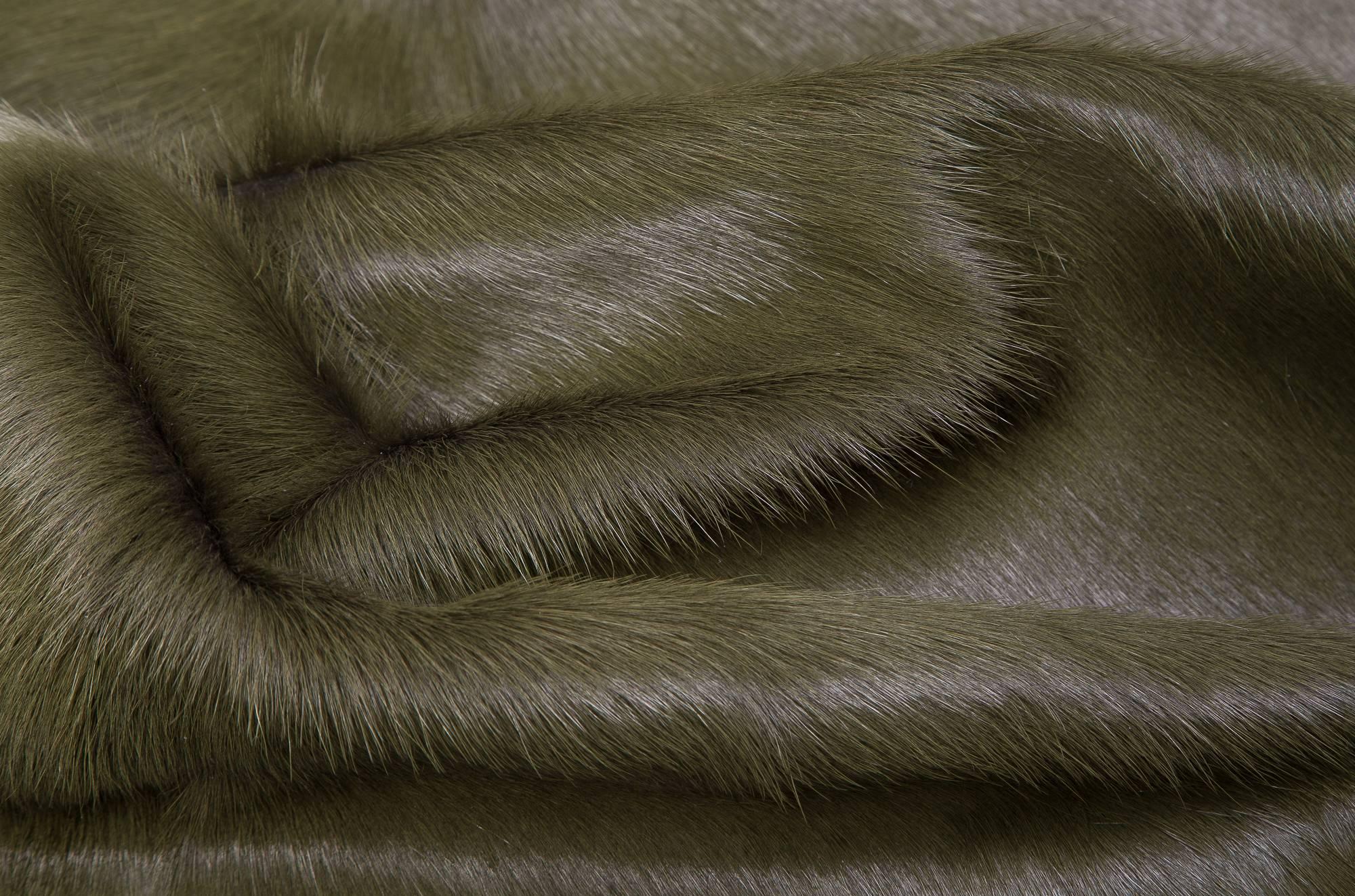 Hunter Green cowhide rug all of our hair cow hides are full hides and measure approximately 7' W x 8' L. They are of the highest quality from the French region of Normandy and naturally raised in a free roaming field. The hair of these cows is very