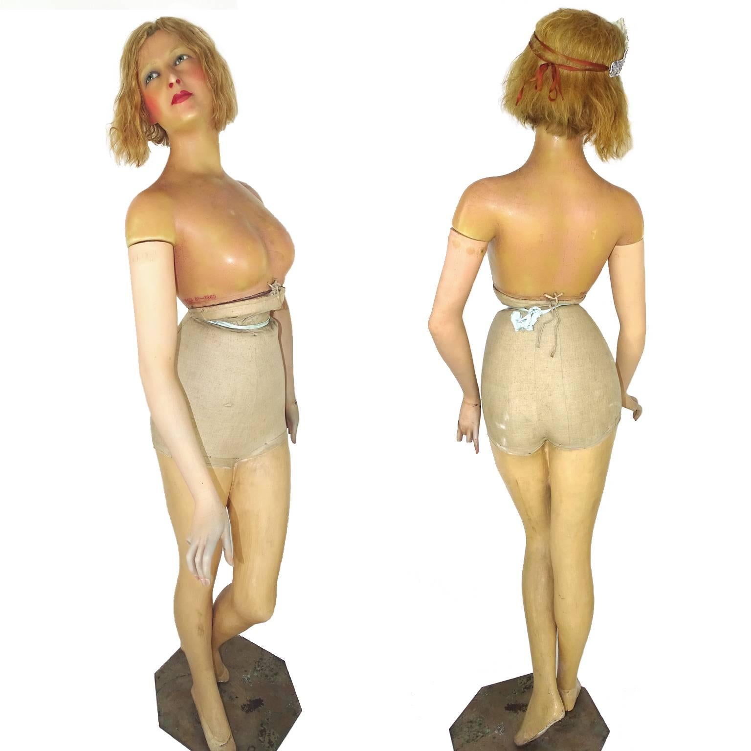 A beautiful antique French full-size wax mannequin made by the famous French maker P. Imans, she's from circa 1910-1920, these kind of mannequins were used for showing clothing, hats and jewelry collections in the exclusive, French 