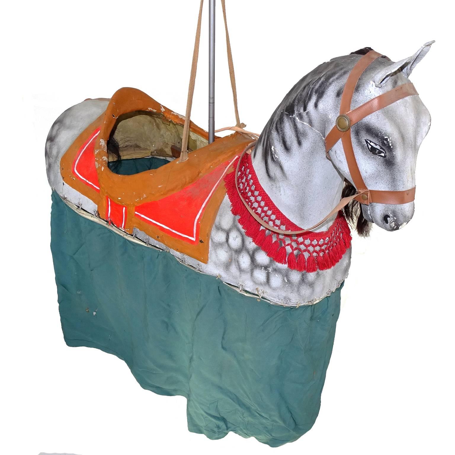 A beautiful French paper mach horse carnival costume from circa 1890.
it's a hand-painted paper mache horse 