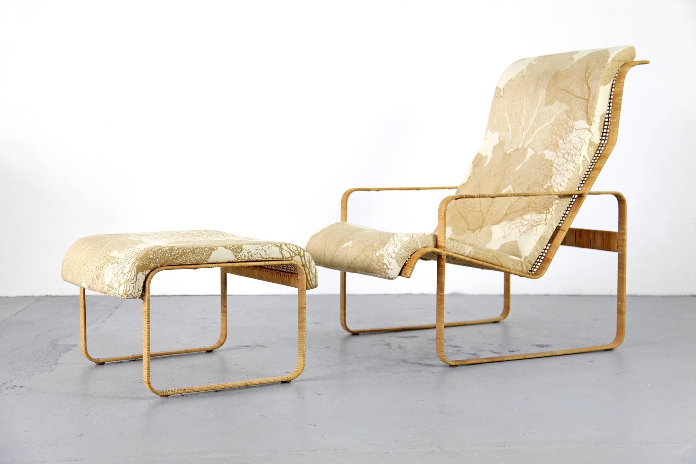 Extremely rare lounge chair and ottoman by Kill International. The frame is made of steel and covered with rattan.