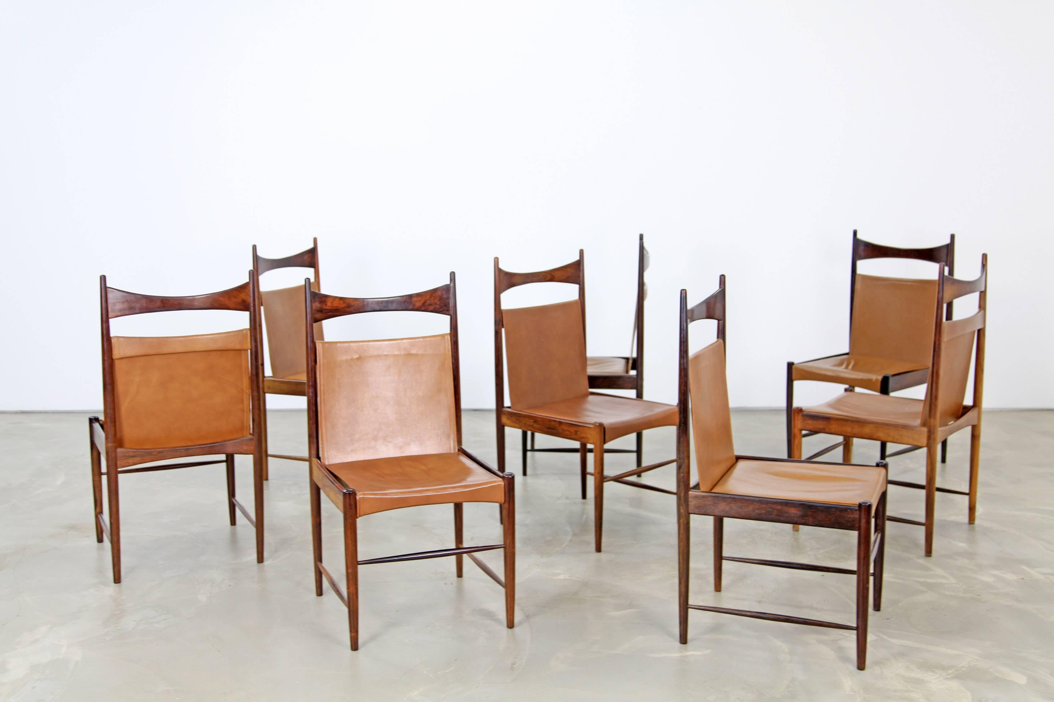 Set of eight dining chairs from Brazil by Sergio Rodrigues. The chairs are in beautiful condition.