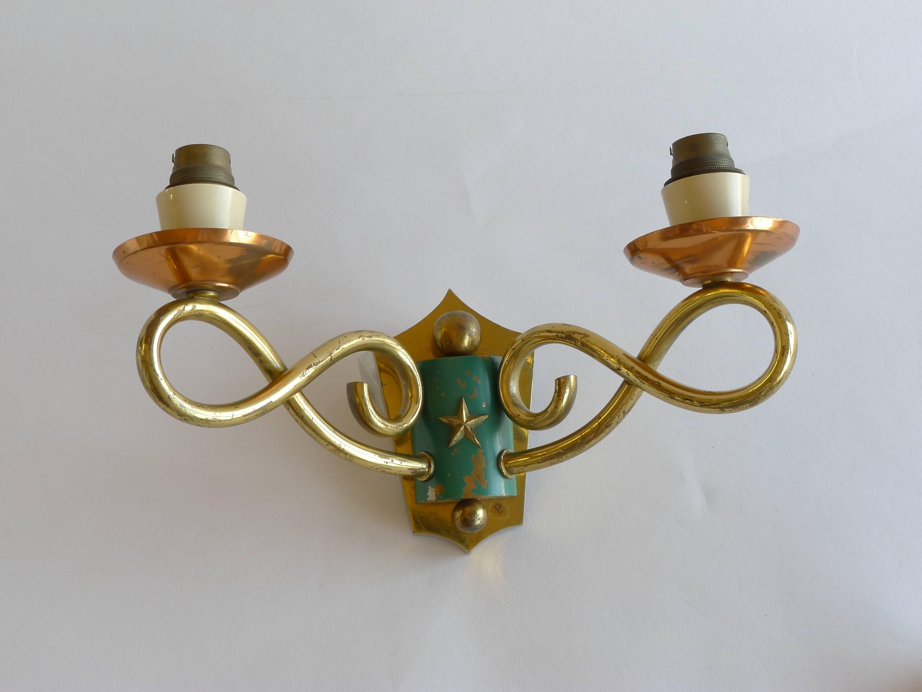 Pair of 1930s French Regency wall sconces. Finished in polished brass, copper and lacquered green. Wired for Europe, conversion for US would be required.

Architect, Sandy Littman of Duesenberg LTD.  and The American Glass Light Company have been