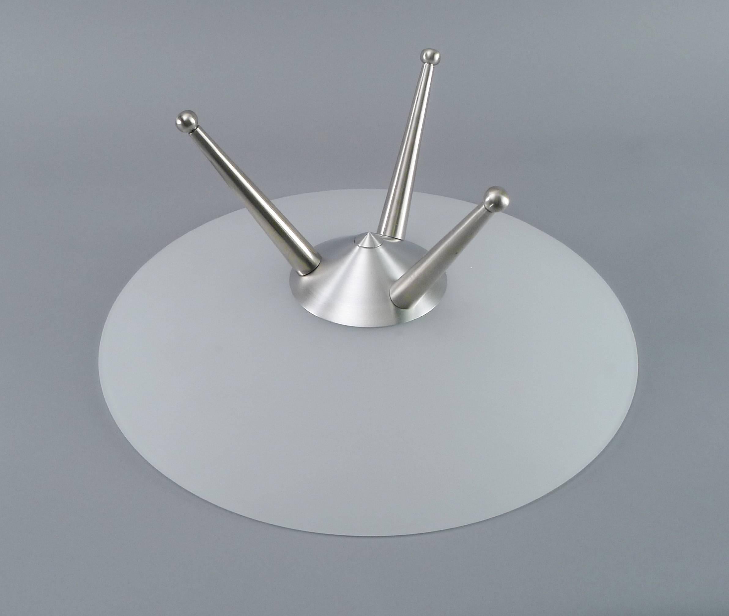 Shallow glass serving bowl with satin aluminum legs in Memphis style. (3) Solid machined alumiunm legs.
