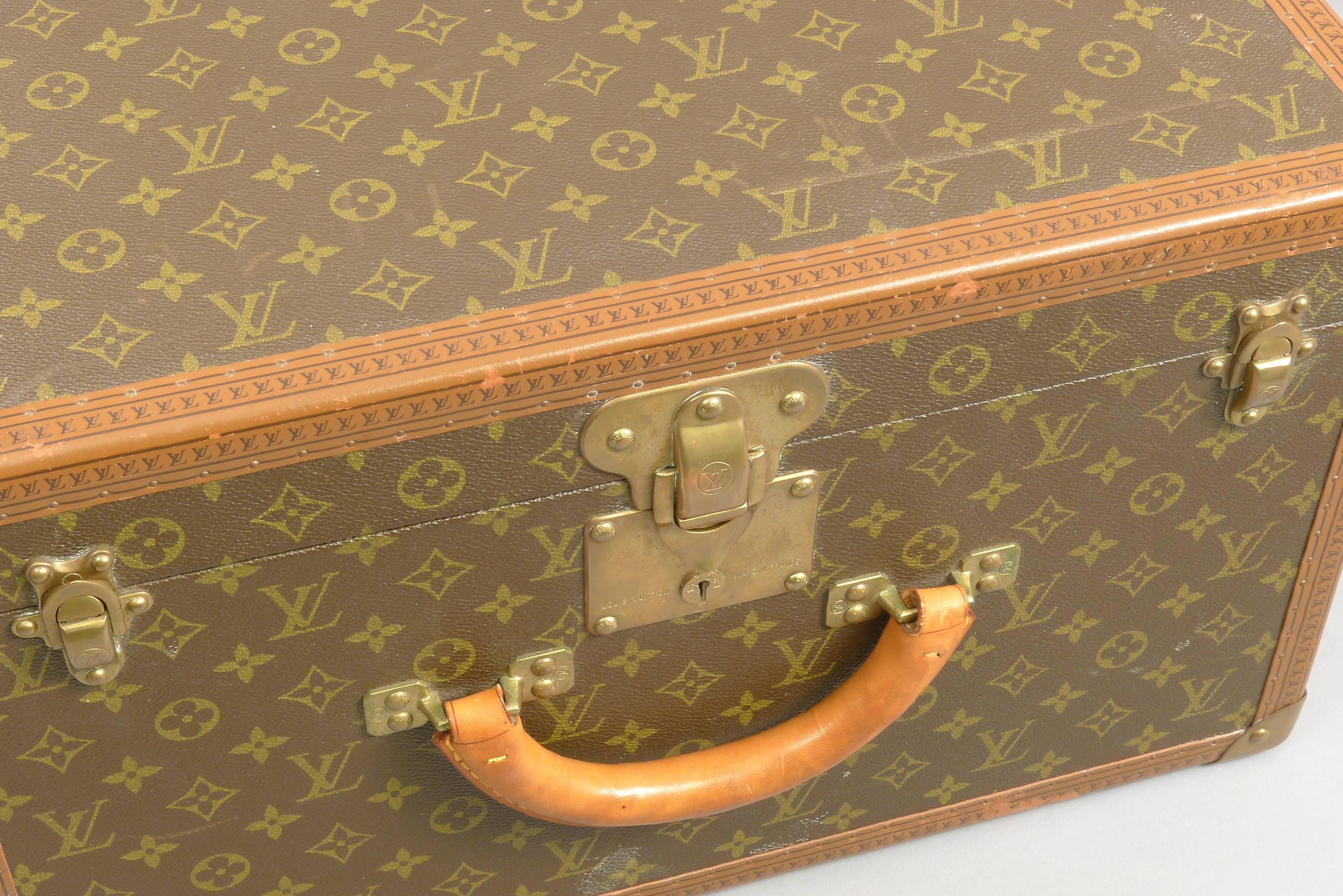 Unmatched set of vintage Louis Vuitton suitcases, leather and brass. Both have marking stamp on interior (see photos). These are an unmatched set of suitcases, both are 19-1/2 inches square, the size difference is in the height, 11-1/4 inches for
