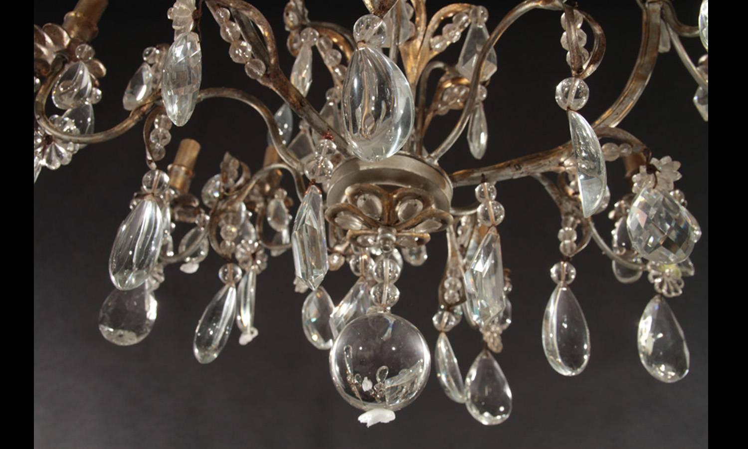 American Hollywood Regency Gilt Decorated Wrought Iron and Crystal Eight-Arm Chandelier For Sale