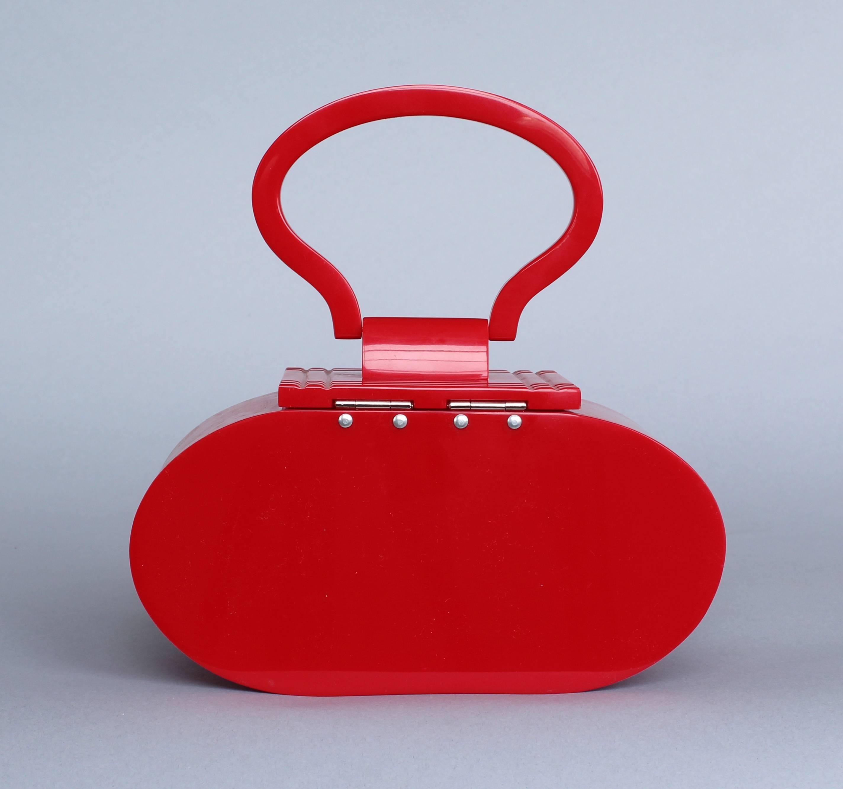 Mid-Century Modern French Red Lucite Handbag with Chrome Clasp, circa 1960