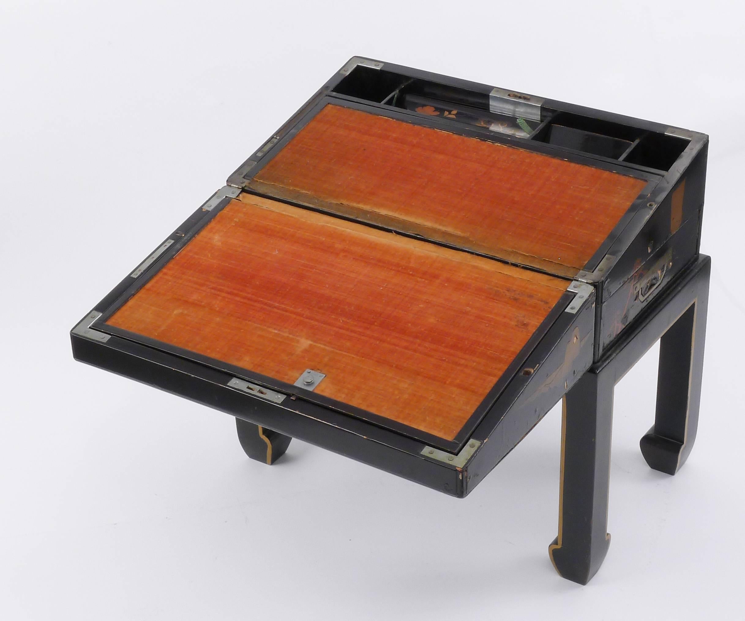 Japanese lap desk on stand with interior fold-out writing surface.

Architect, Sandy Littman of Duesenberg LTD.  and The American Glass Light Company have been making beautiful objects and collecting gorgeous antiques for nearly 40 years.