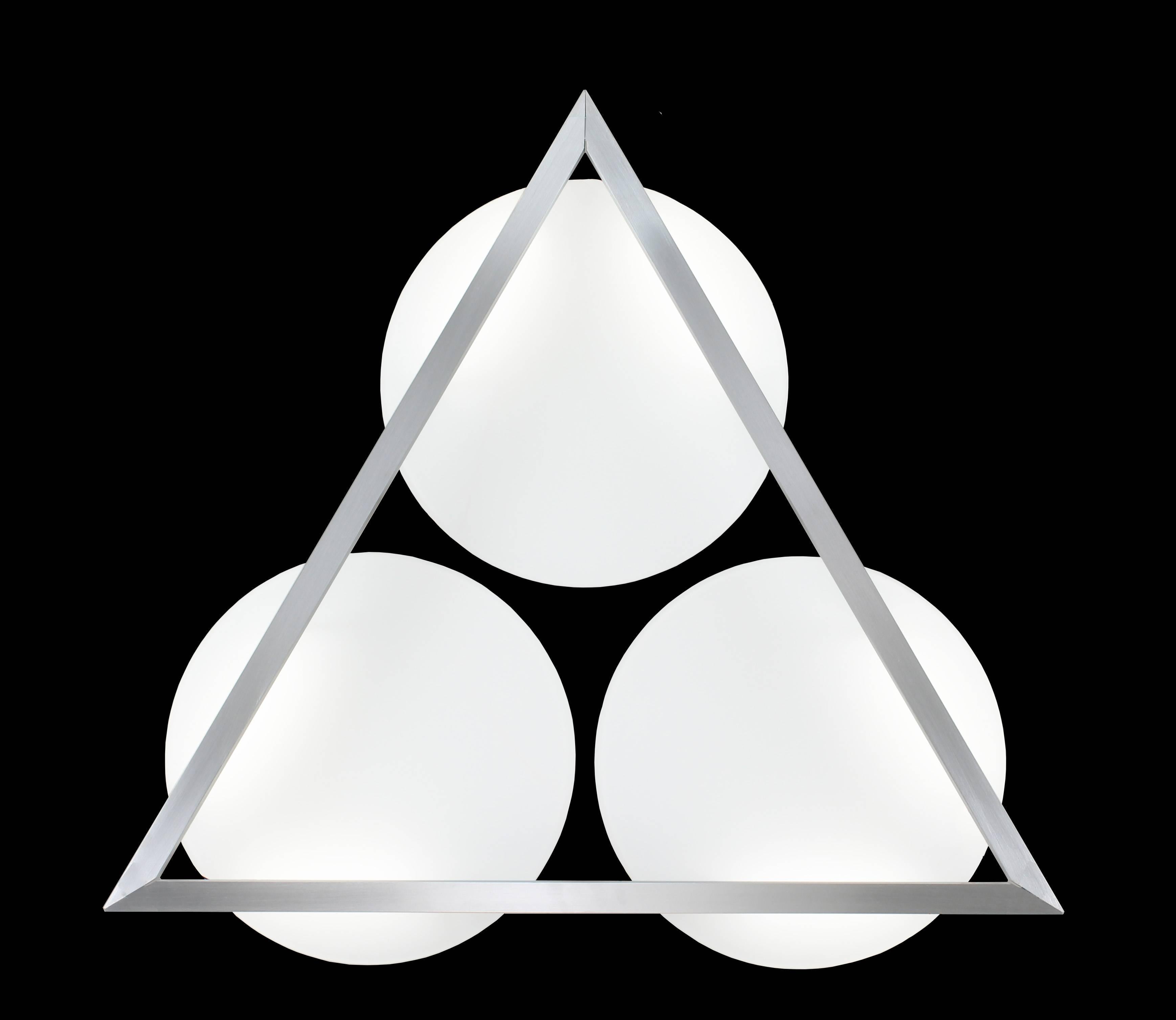 Triangular aluminium frame with white glass disks wall sculpture. Can be used in place of wall art as a decorative feature. In the manner of Mid-Century Modern design style with a Pop-Art feel. LED illuminated 3000K standard color