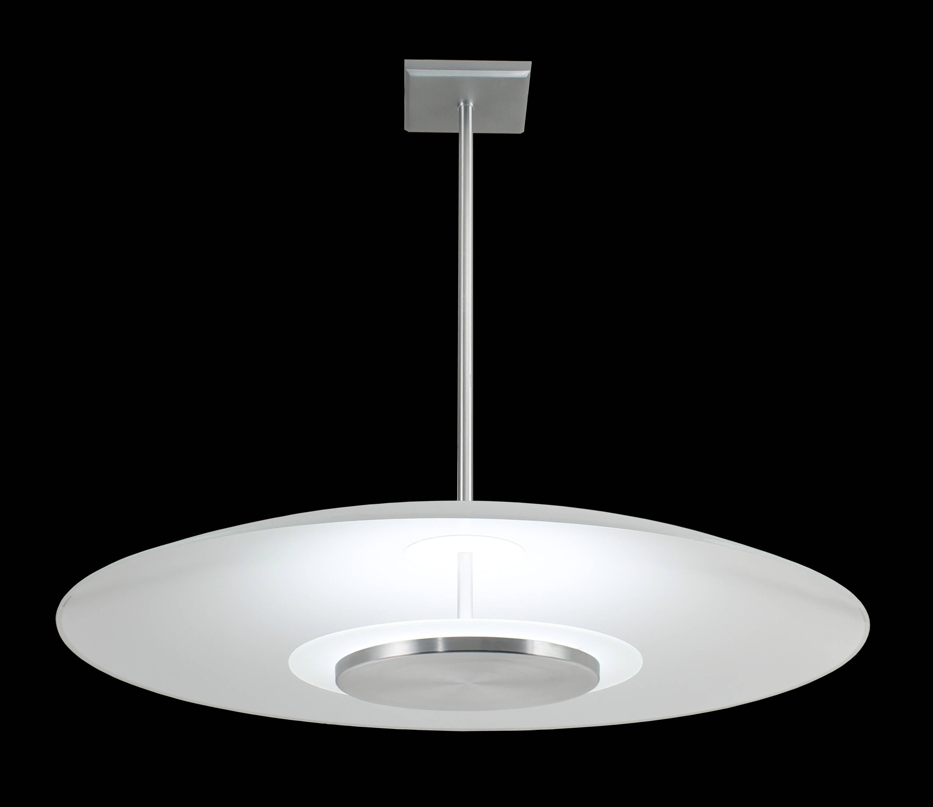 32 inch diameter reverse glass bowl pendant light. Mid-Century Modern style. Top glass bowl acts as a reflector for the lower spread lens. Fixture provides reflected light downward and a soft light to the ceiling above through the top glass. LED