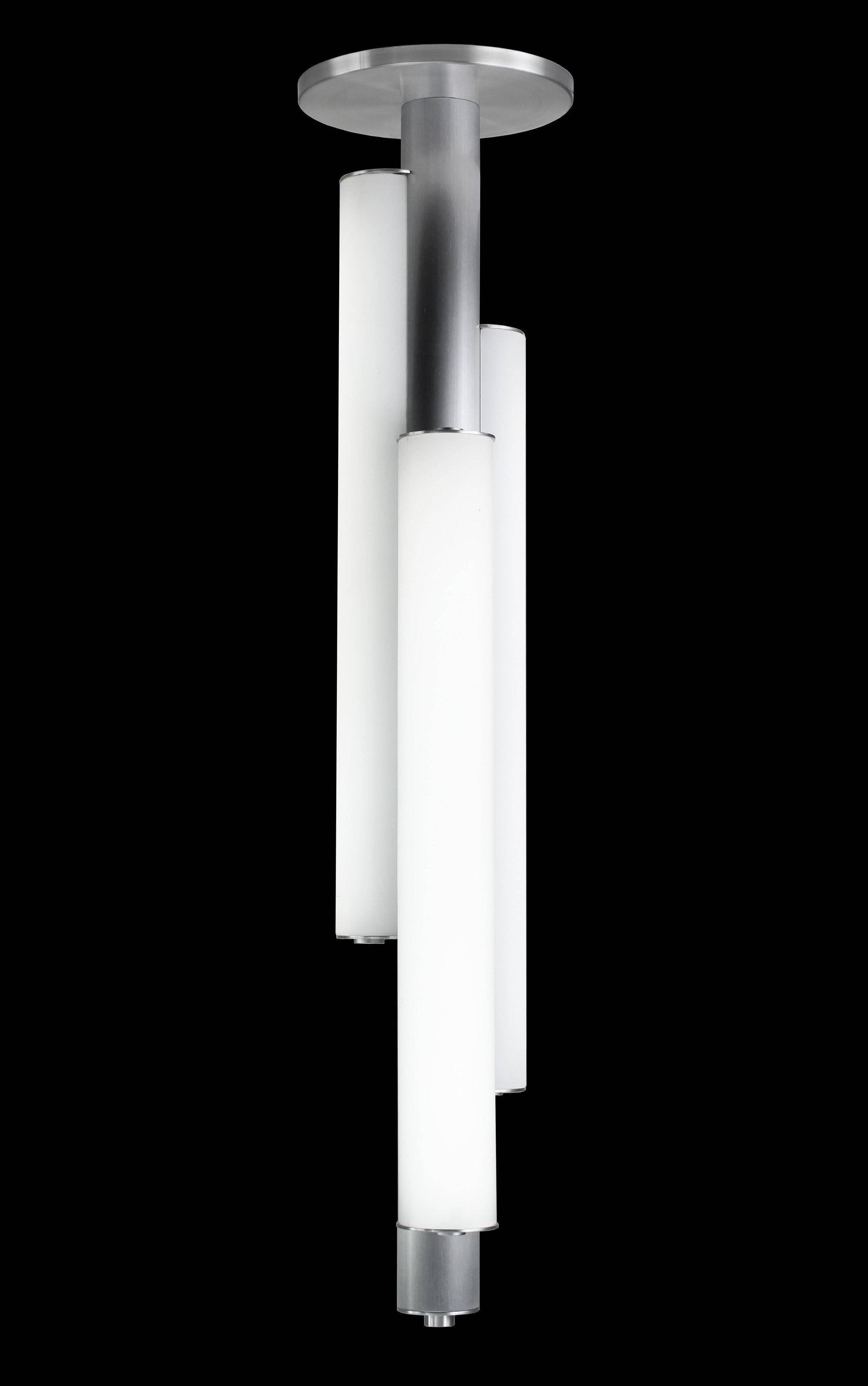 In the manner of Art Deco. Triple white glass cylinder ceiling pendant light. Aluminium centre tube supports three glass cylinders with rhythmic height differences. LED 3000K standard color temperature.

Architect, Sandy Littman of Duesenberg LTD. 
