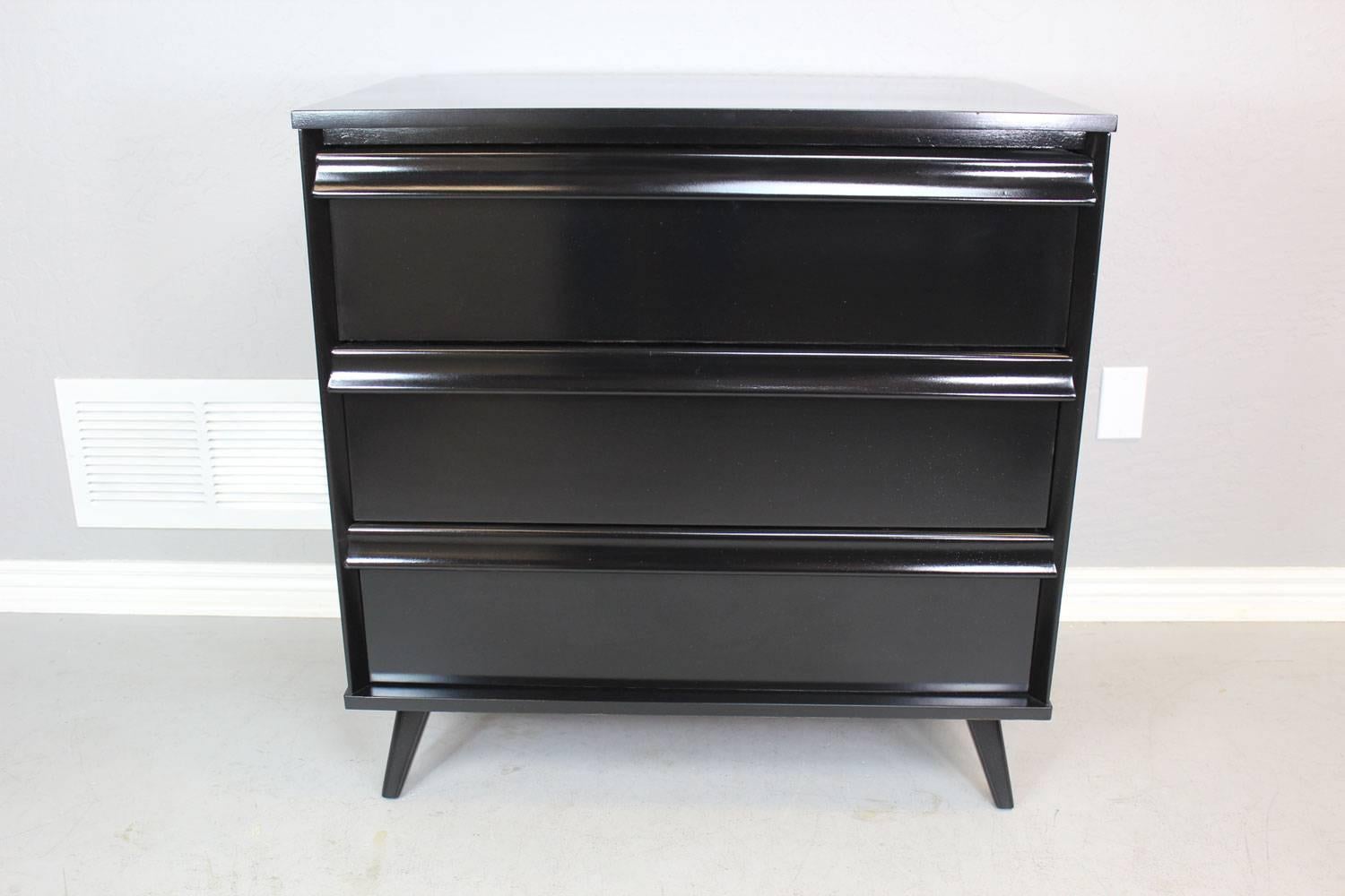 Baumritter chest of drawers in ebony gloss finish. Restored.