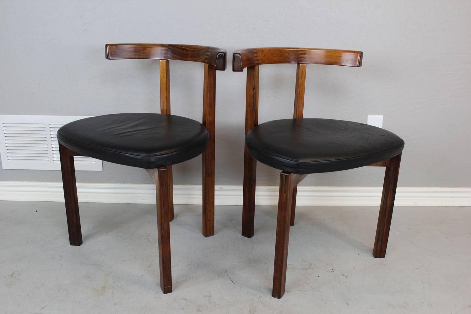 Pair of rare original leather T-chairs by Peter Hvidt for France and Sons. Rosewood with unique and well crafted finger joints throughout.